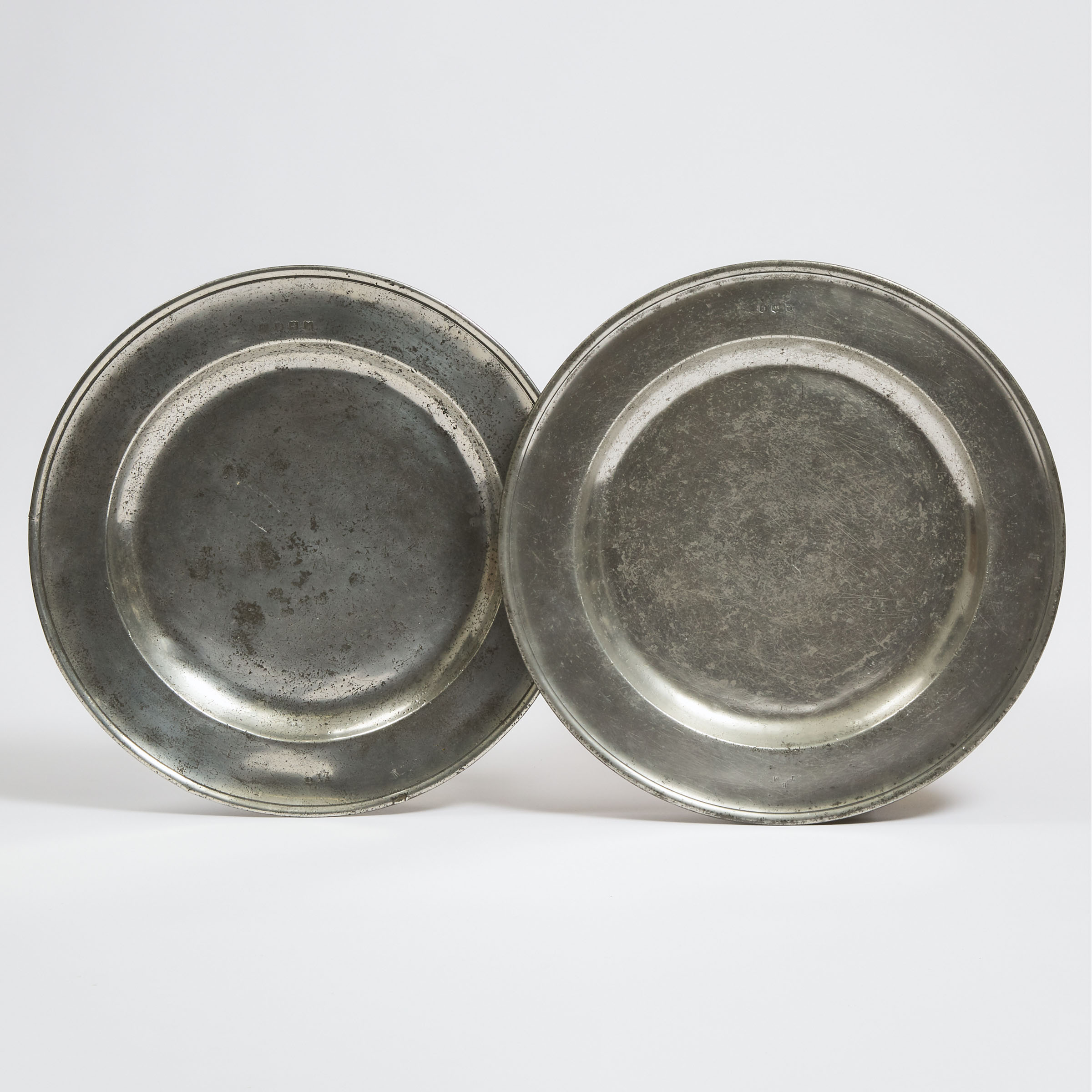 Two English Pewter Dishes, early 18th century