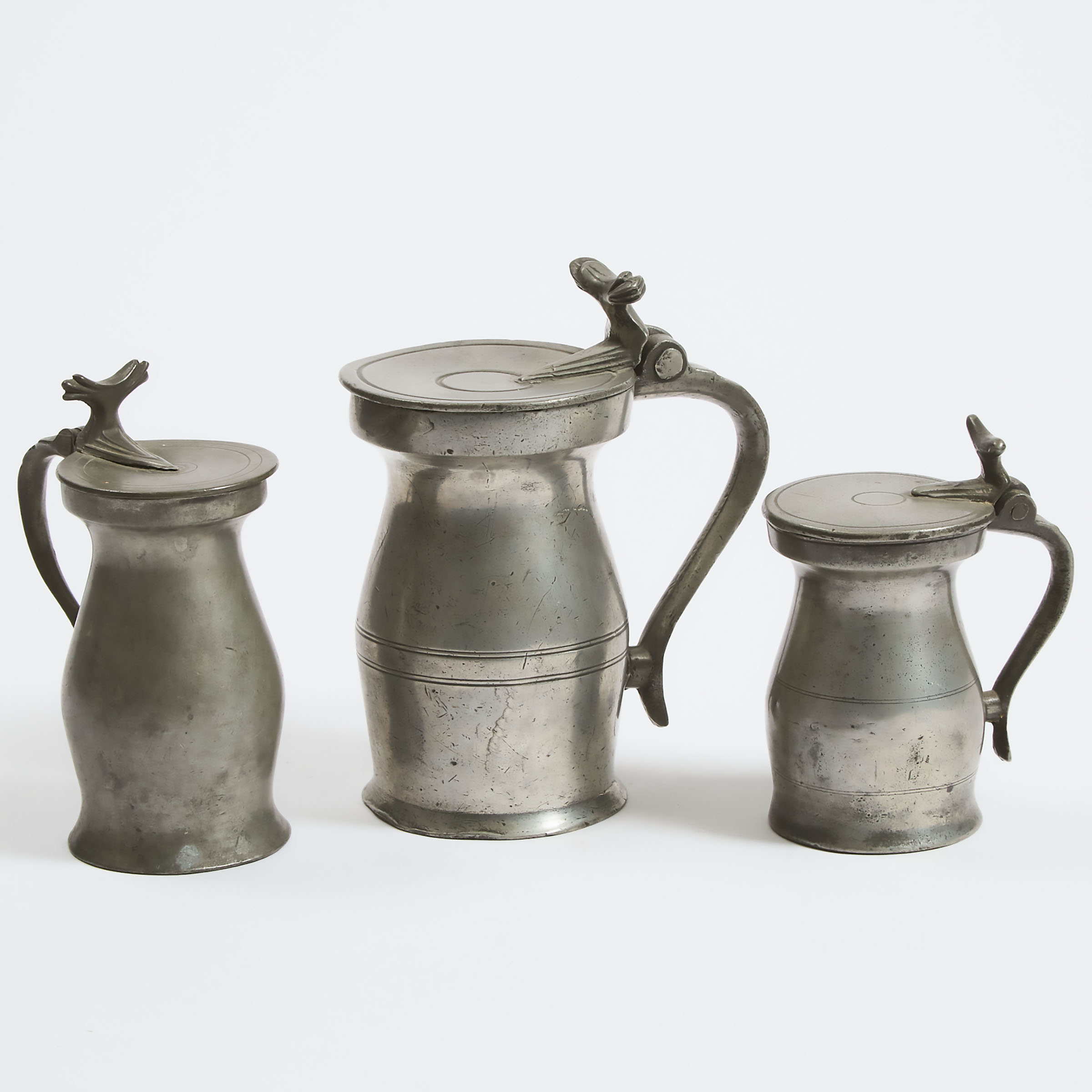 Three English Pewter Flat Lidded Bud Wine Measures, 18th/early 19th century