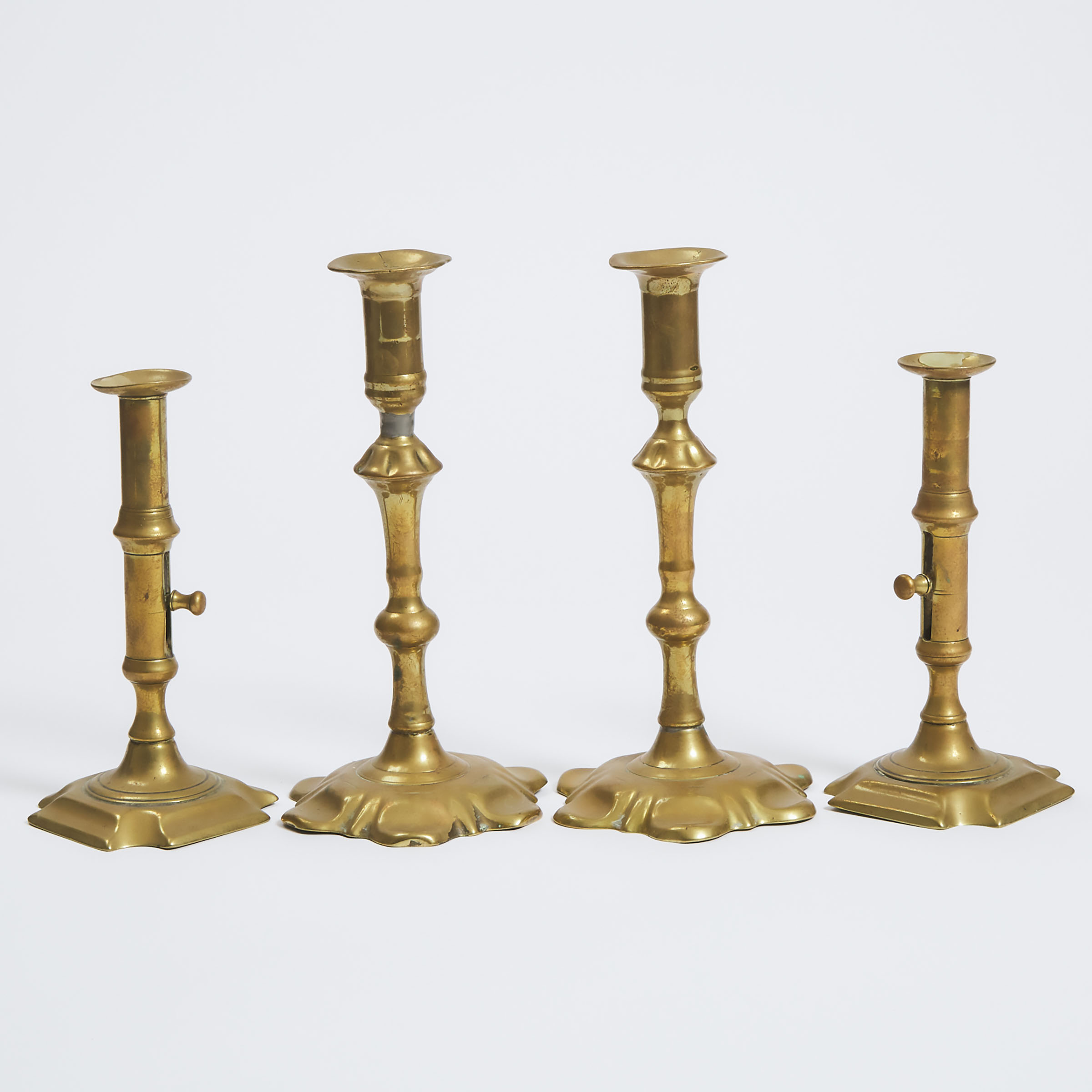 Two Pairs of English Brass Adjustable Candlesticks, 18th century