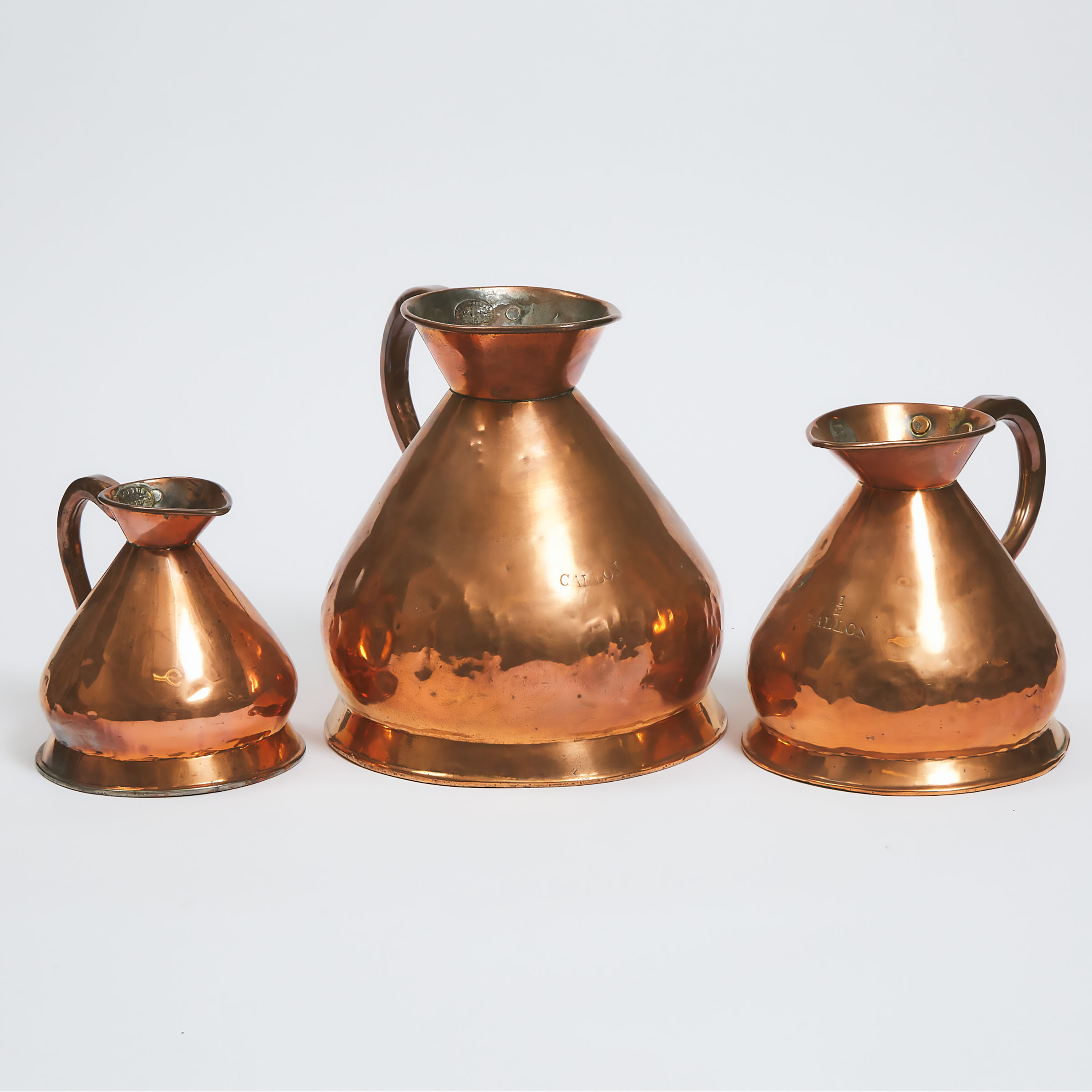 Three Graduated Copper Haystack Measures, 19th century