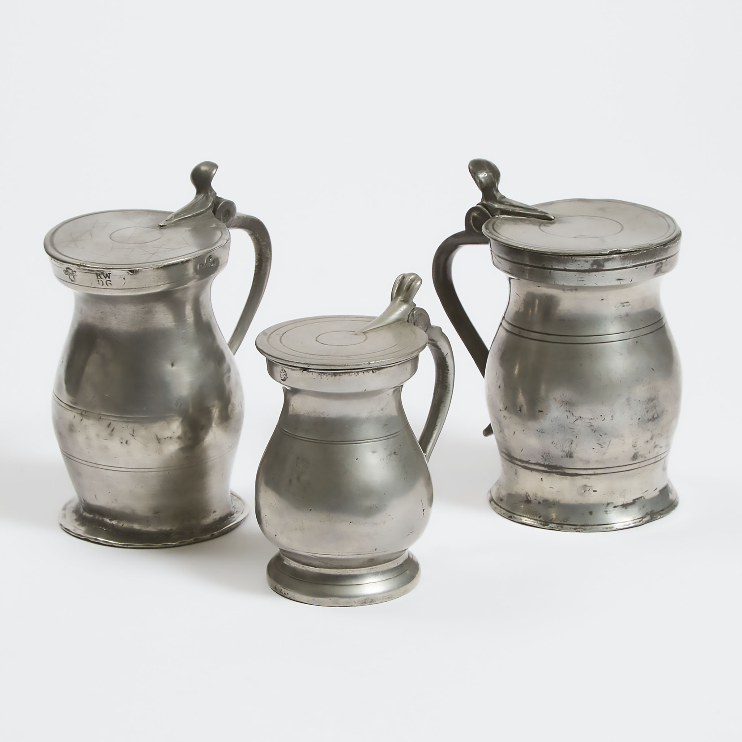 Three Scottish Pewter Flat Lidded Baluster Form Imperial Measures, 19th century