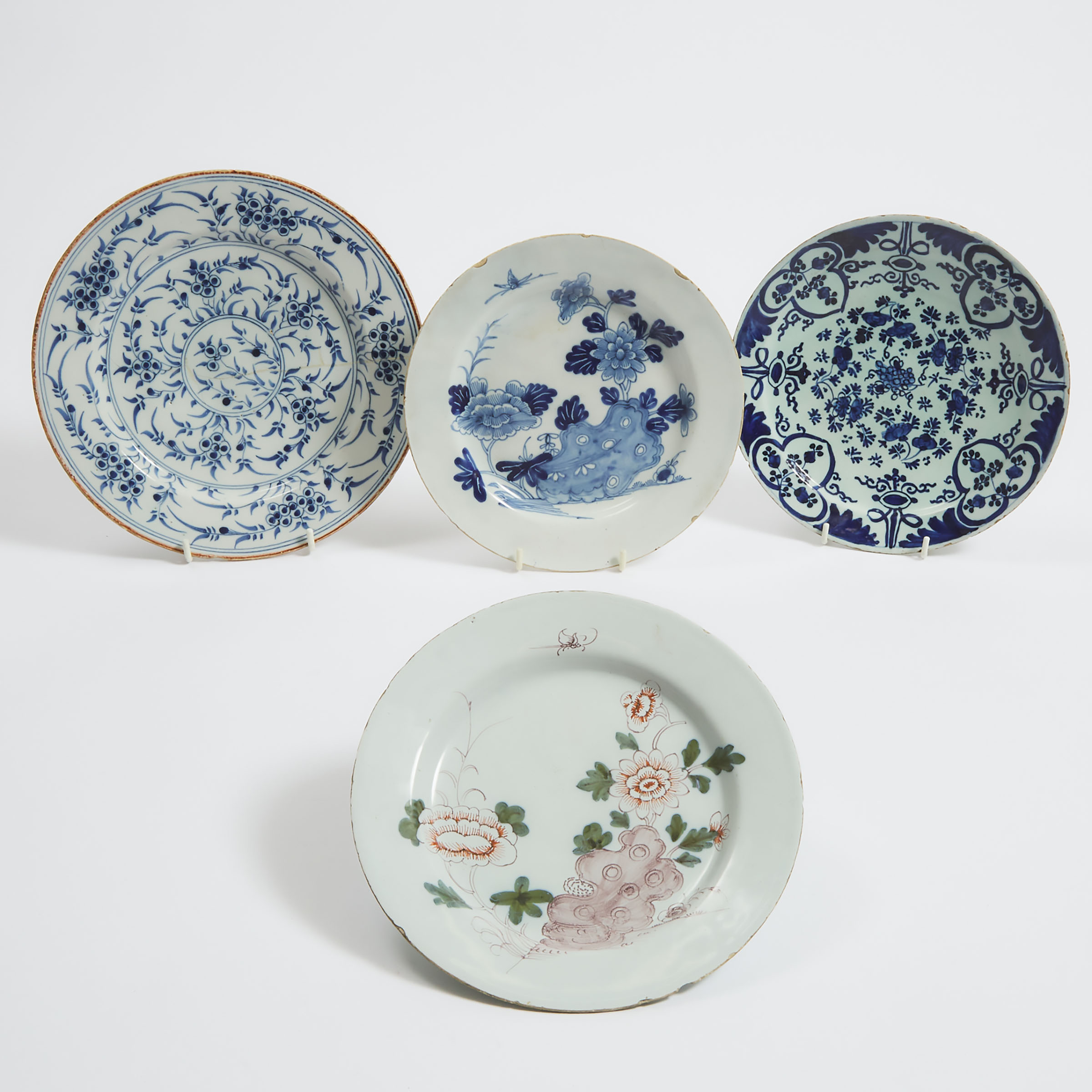 Four English Delft Plates, 18th century