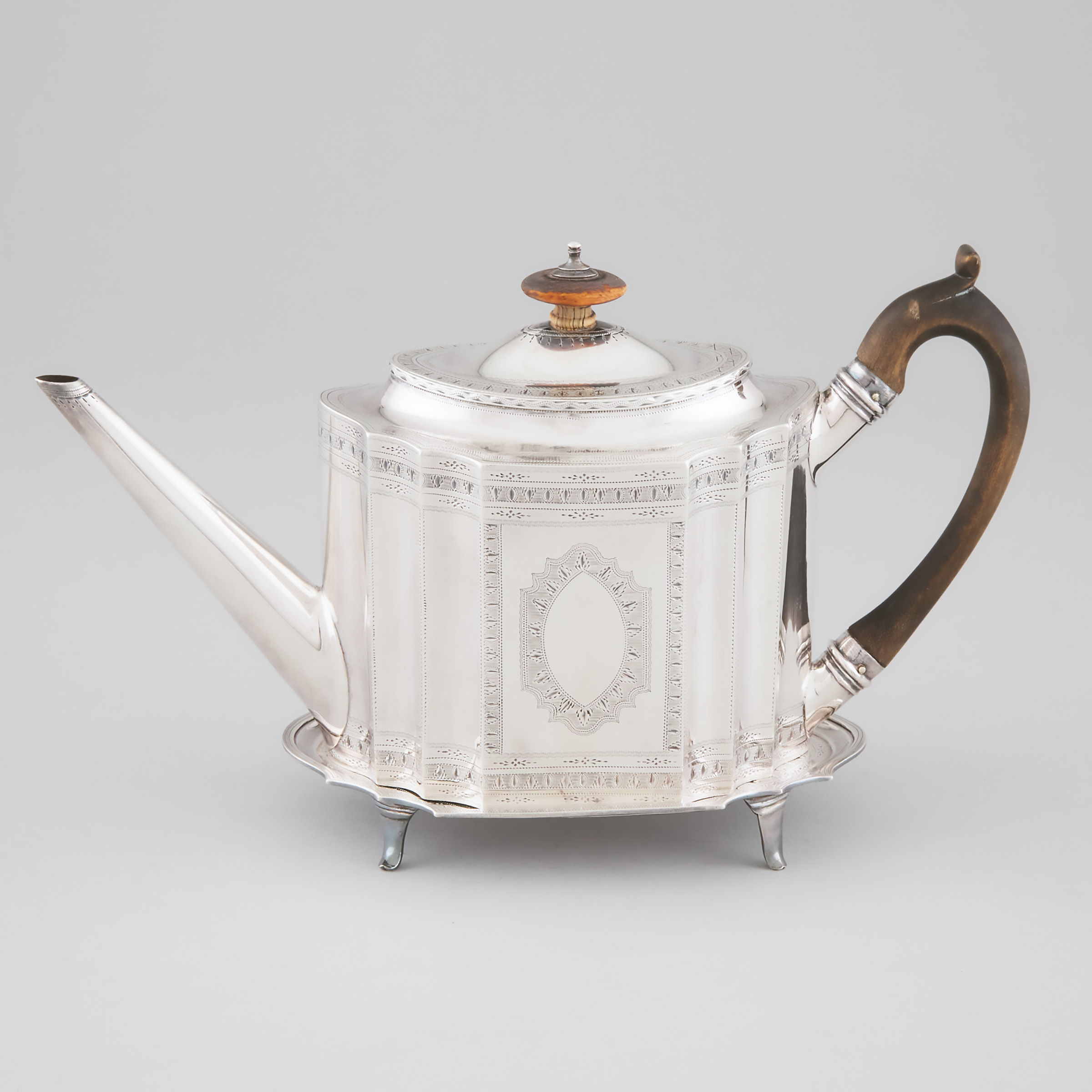 George III Silver Bright-Cut Shaped Oval Teapot and Stand, Charles Hougham, London, 1791/92