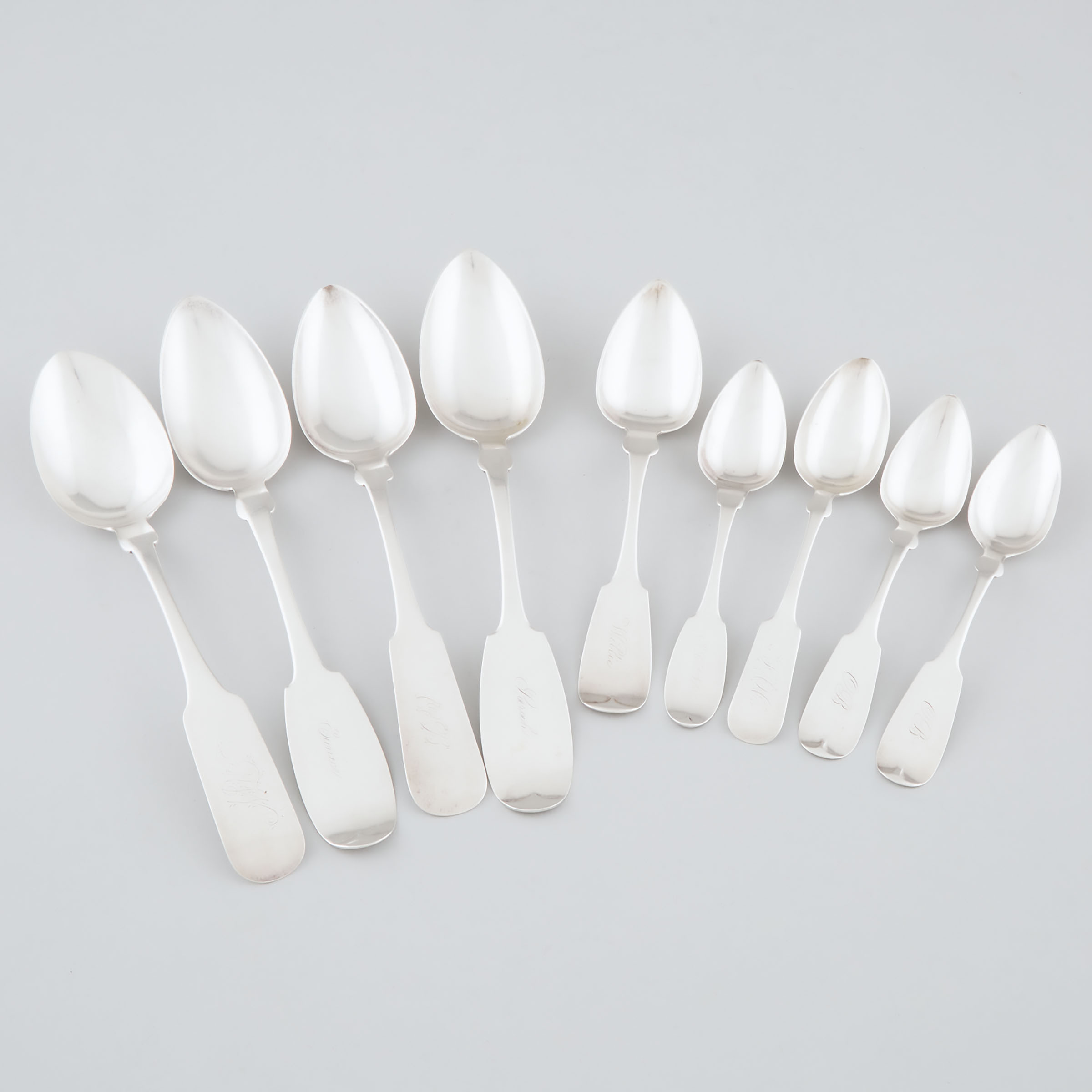 Four American Silver Fiddle Pattern Table Spoons, a Dessert Spoon and Four Tea Spoons, 19th century