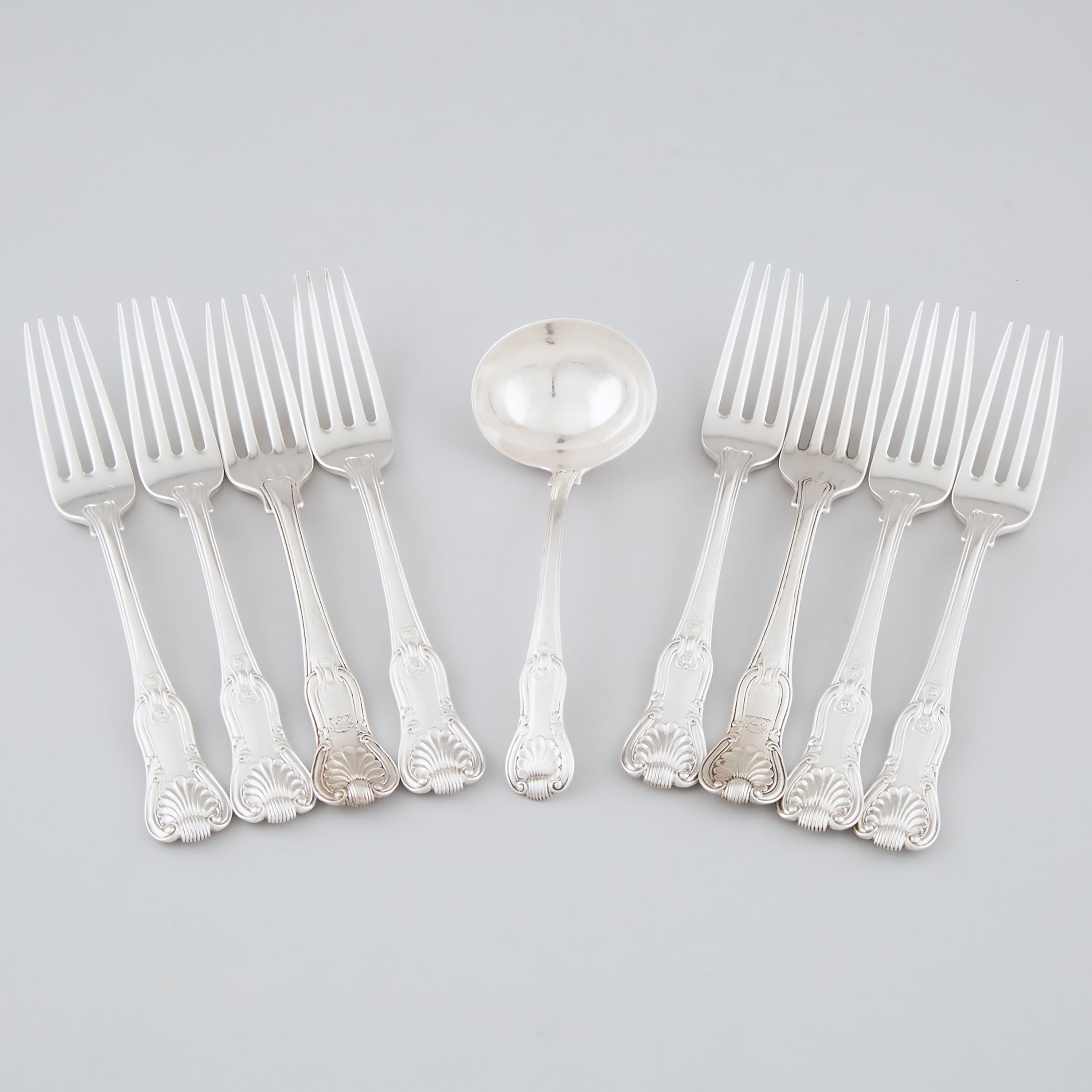Eight George III Silver Hourglass Pattern Table Forks and a Gravy Ladle, Paul Storr, London, 1812/18