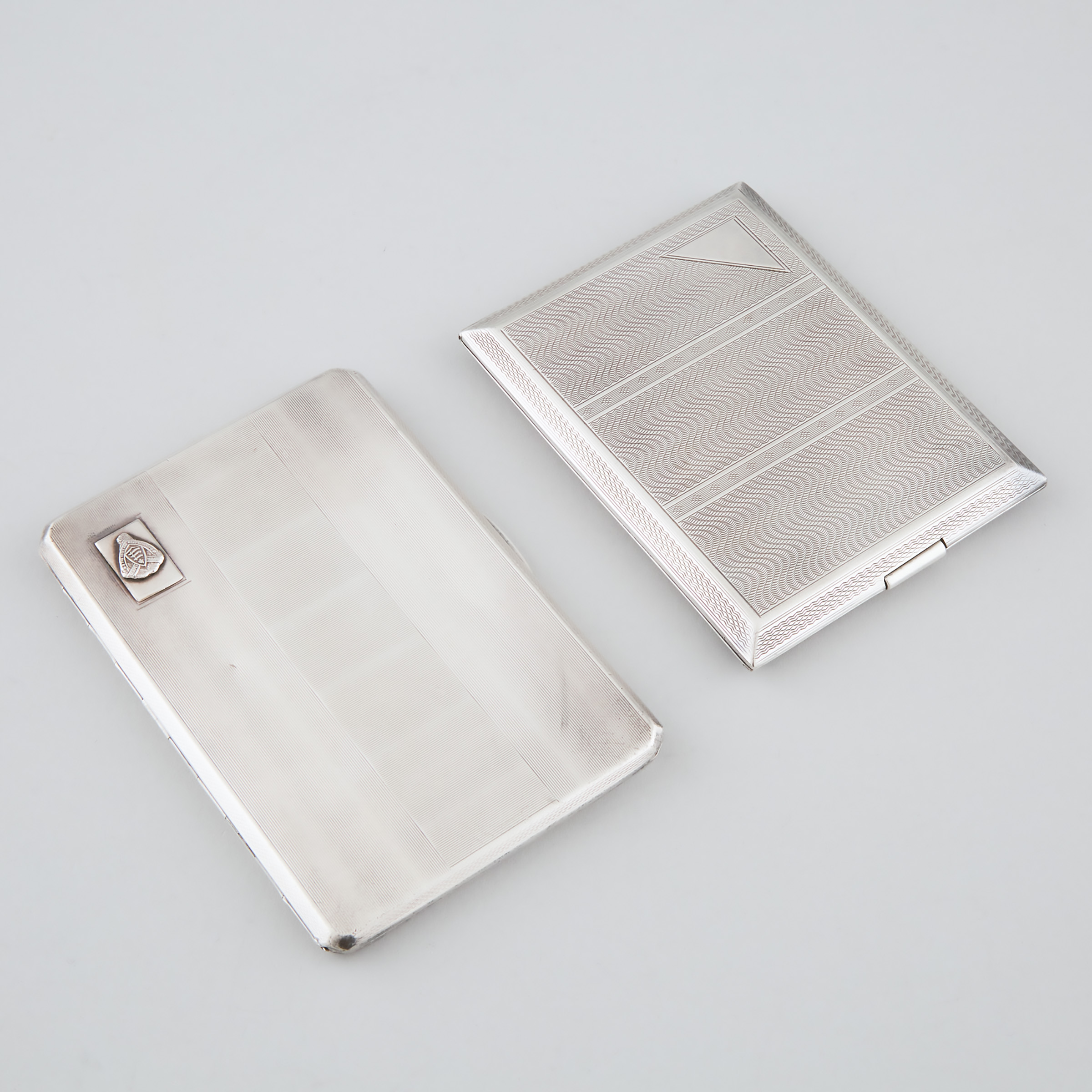 Two English Silver Cigarette Cases, Samuel M. Levi, and W. T. Toghill & Co. for Henry Birks & Co., Birmingham, 1928/1950