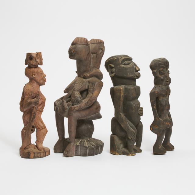 Group of Four Unidentified African Carved Wood Figures, all 20th century