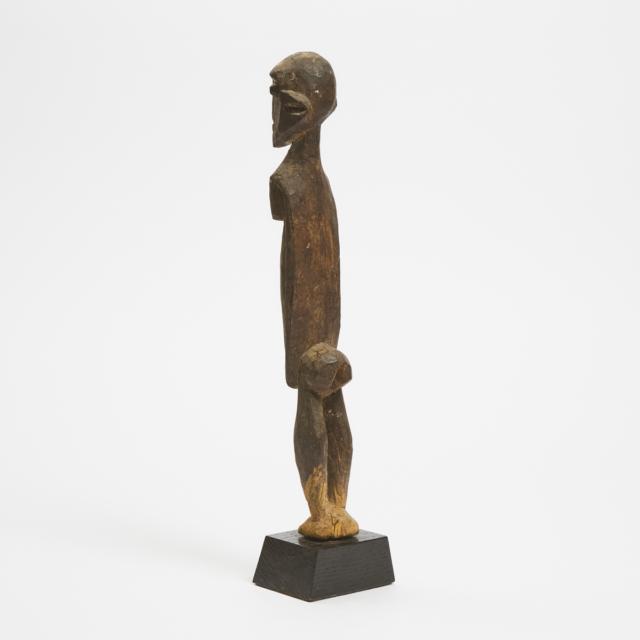 Unidentified African Carved Wood Figure, 20th century