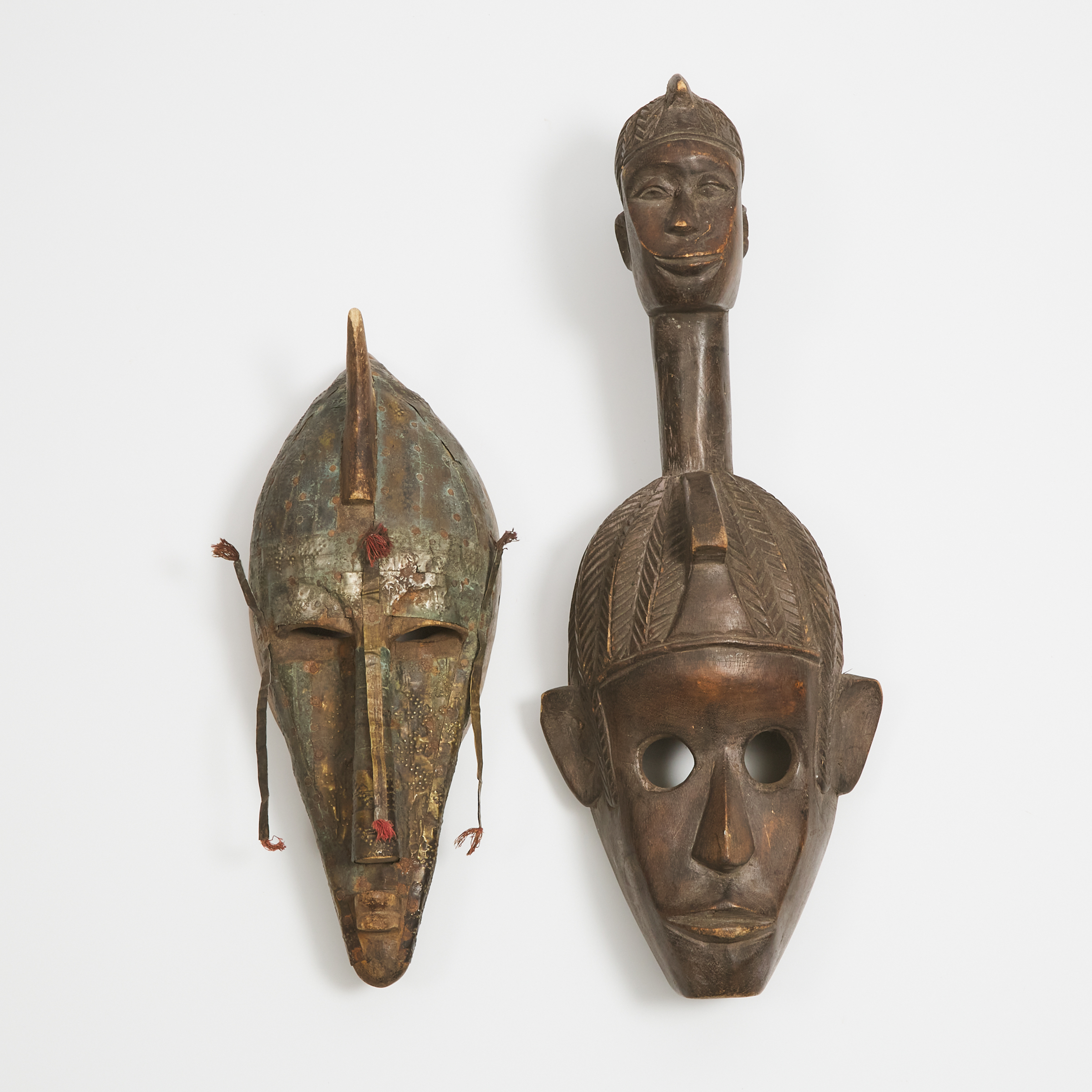 Bamana Marka Mask, Mali, West Africa together with a unidentified mask with figural surmount, 20th century