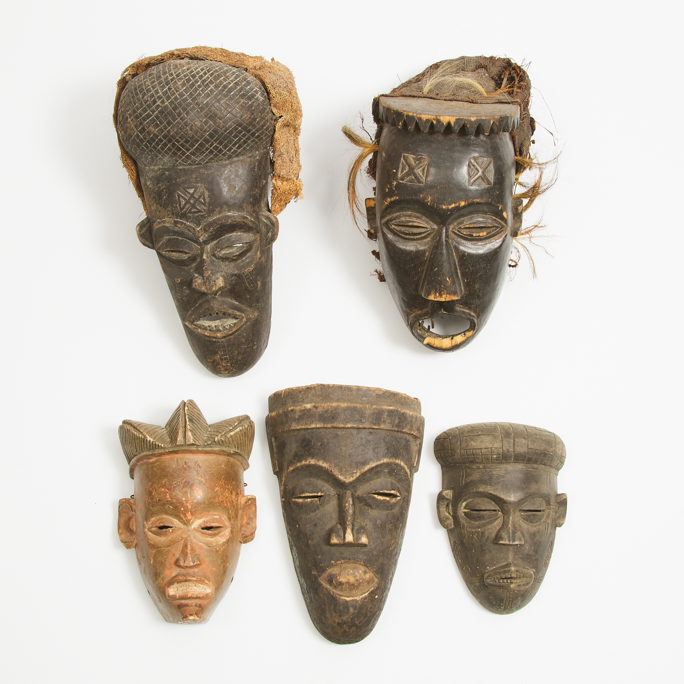 Five Chokwe Masks, two with Headdresses, Democratic Republic of Congo, Central Africa, 20th century