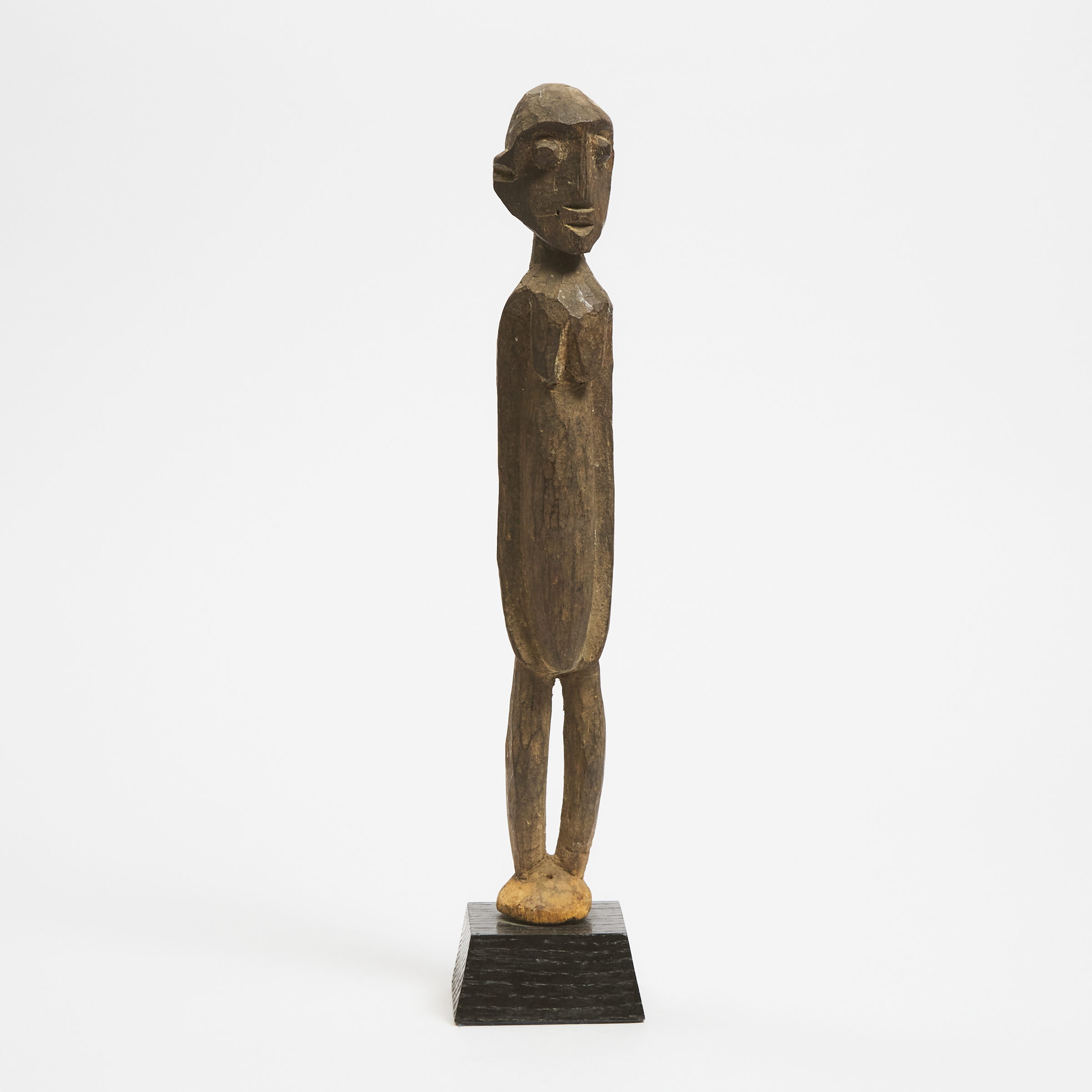 Unidentified African Carved Wood Figure, 20th century
