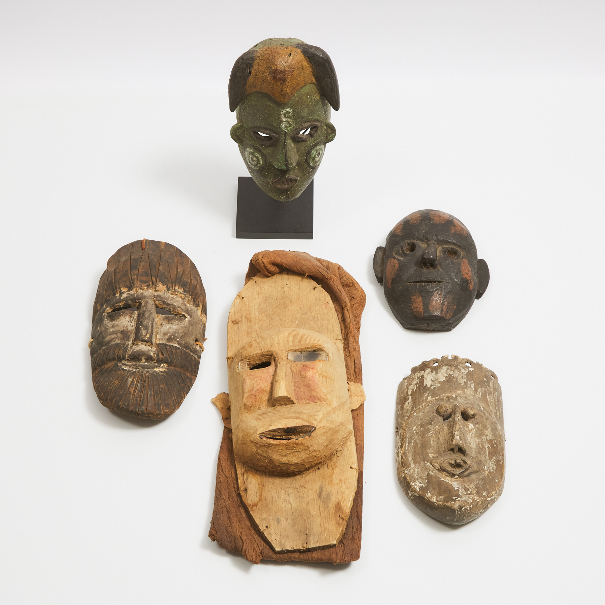 Group of Five Unidentified Masks, 20th century