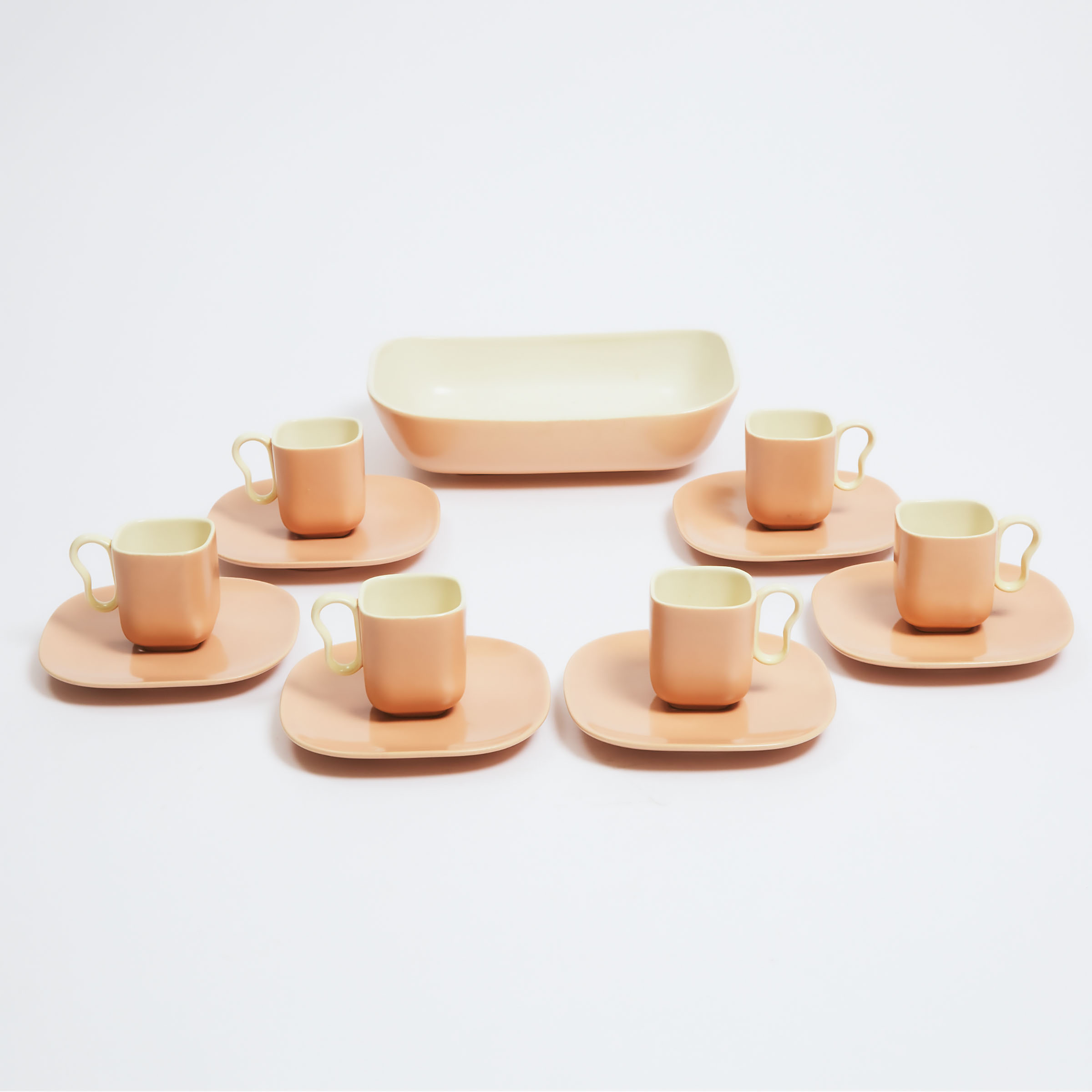 Six Franciscan Cups and Saucers and a Serving Dish, mid-20th century