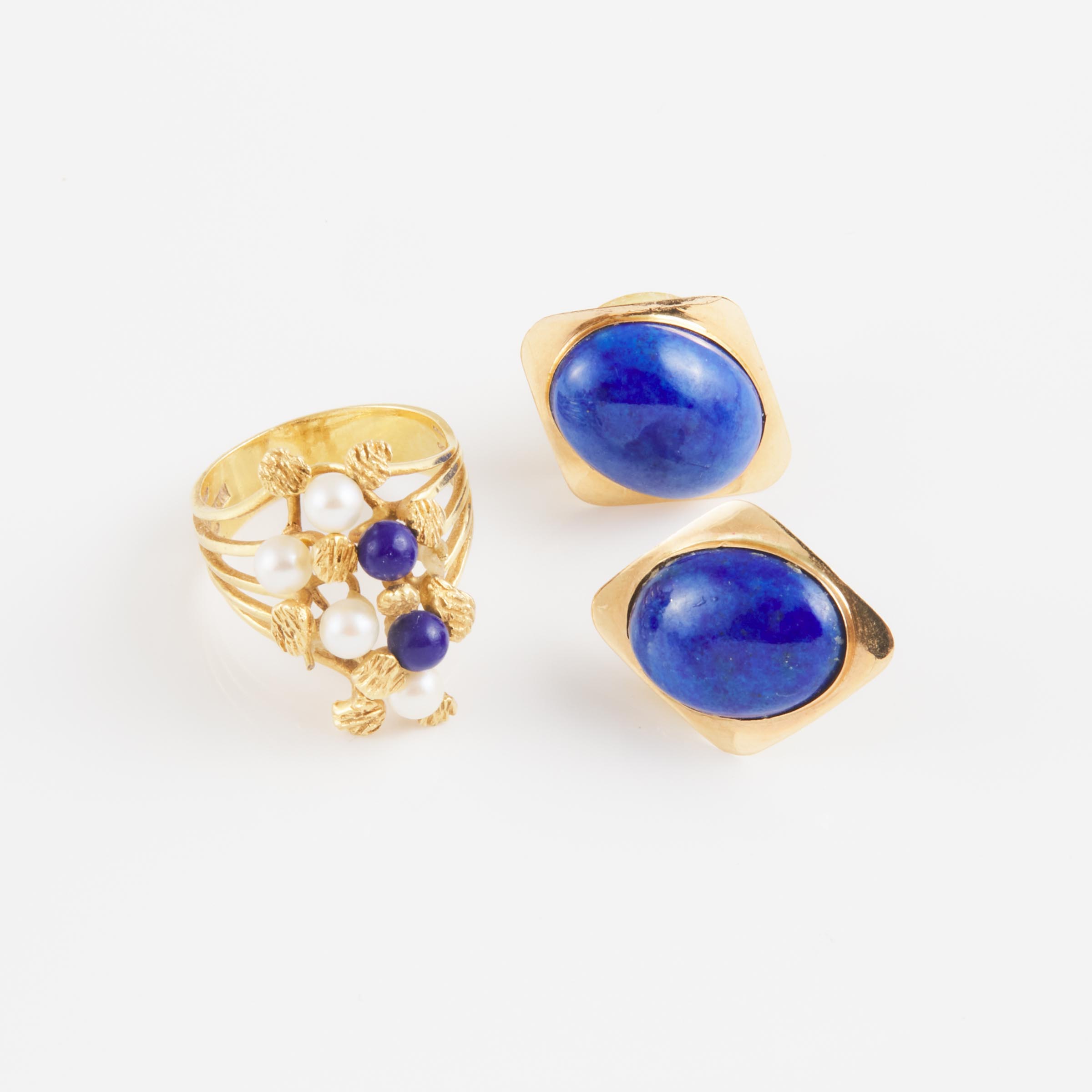 A Pair Of 14k Yellow Gold Earrings And An 18k Yellow Gold Ring