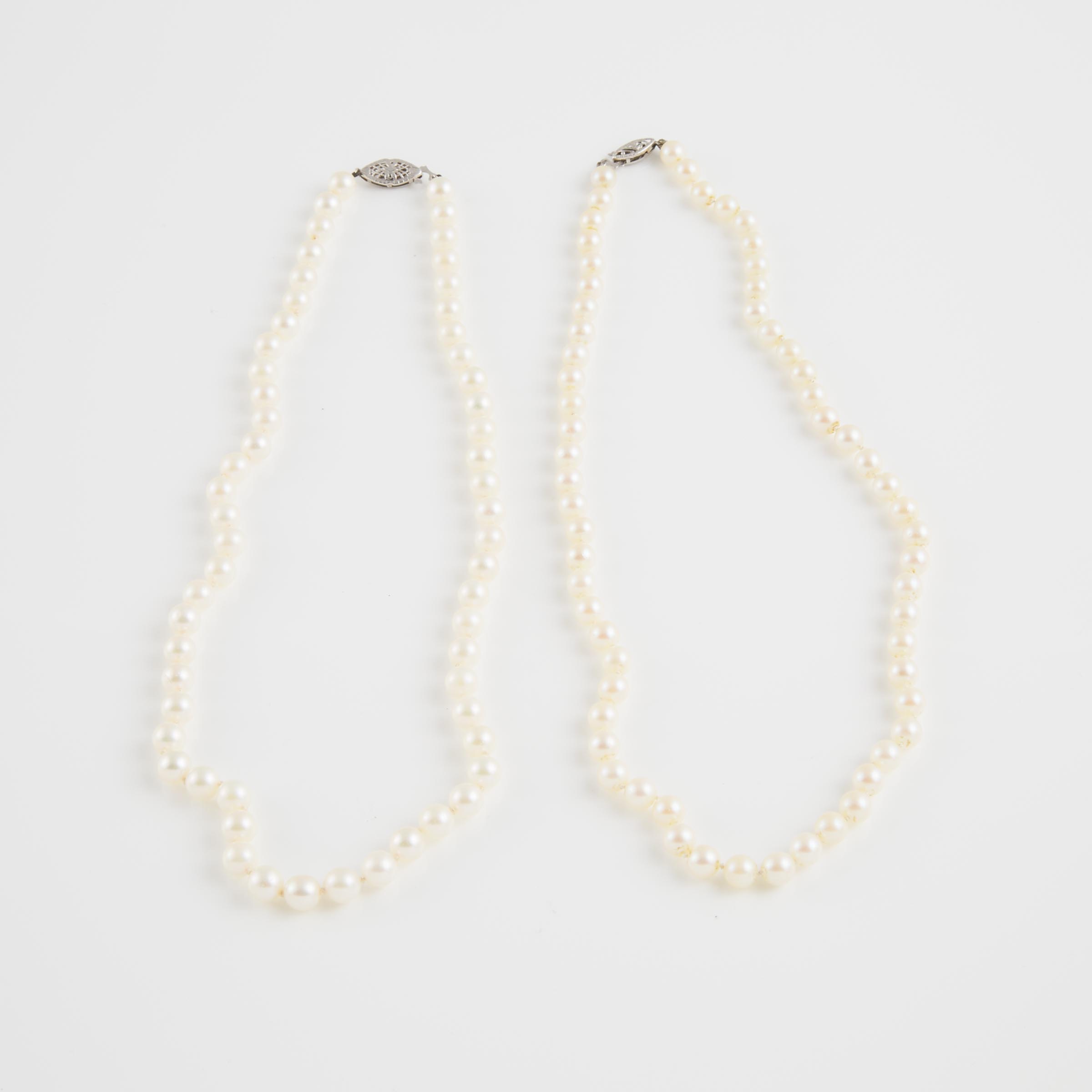 2 Single Strands Of Cultured Pearls
