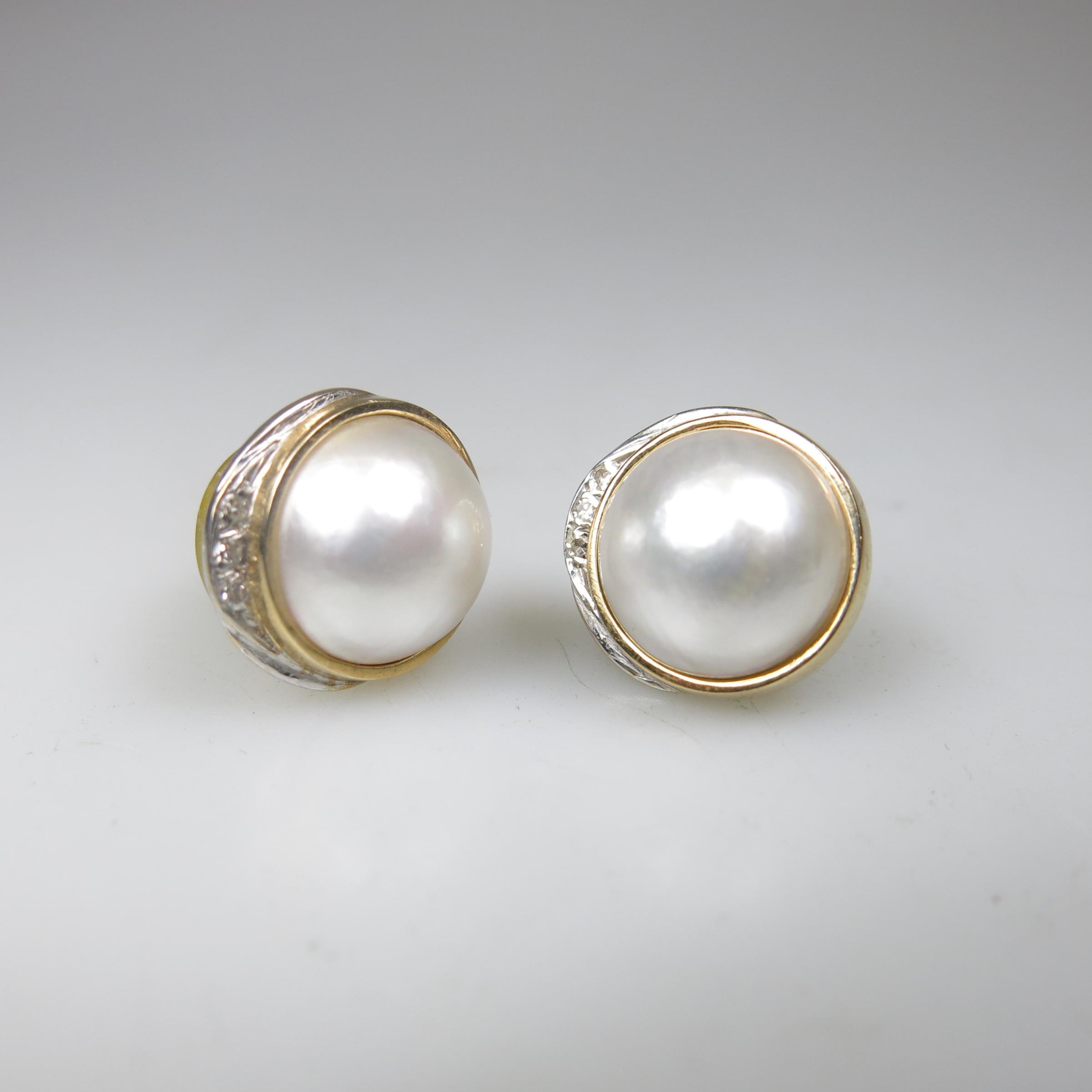 Pair Of 14k Yellow And White Gold Button Earrings
