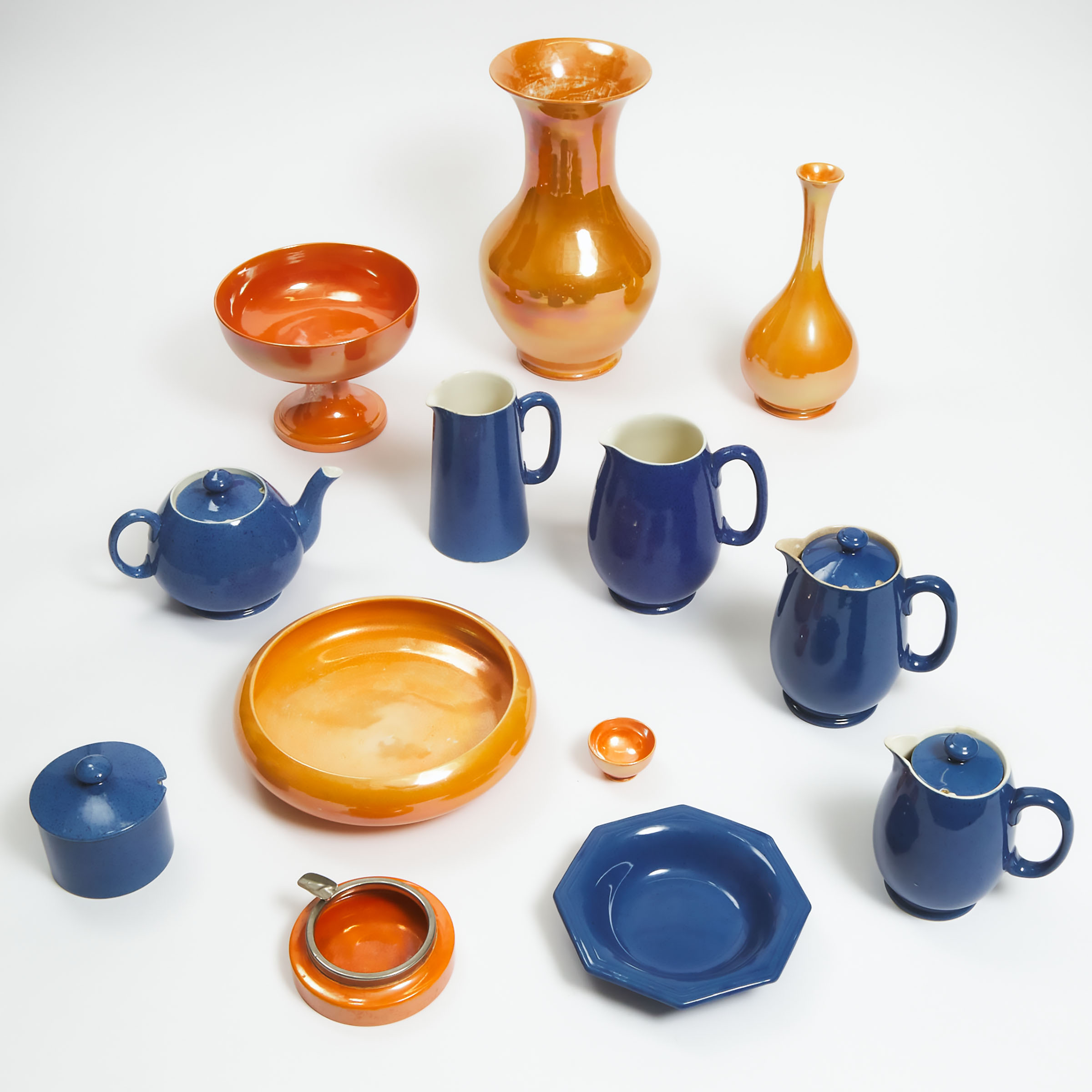 Group of Moorcroft Orange Lustre and Powder Blue Pottery, 20th century
