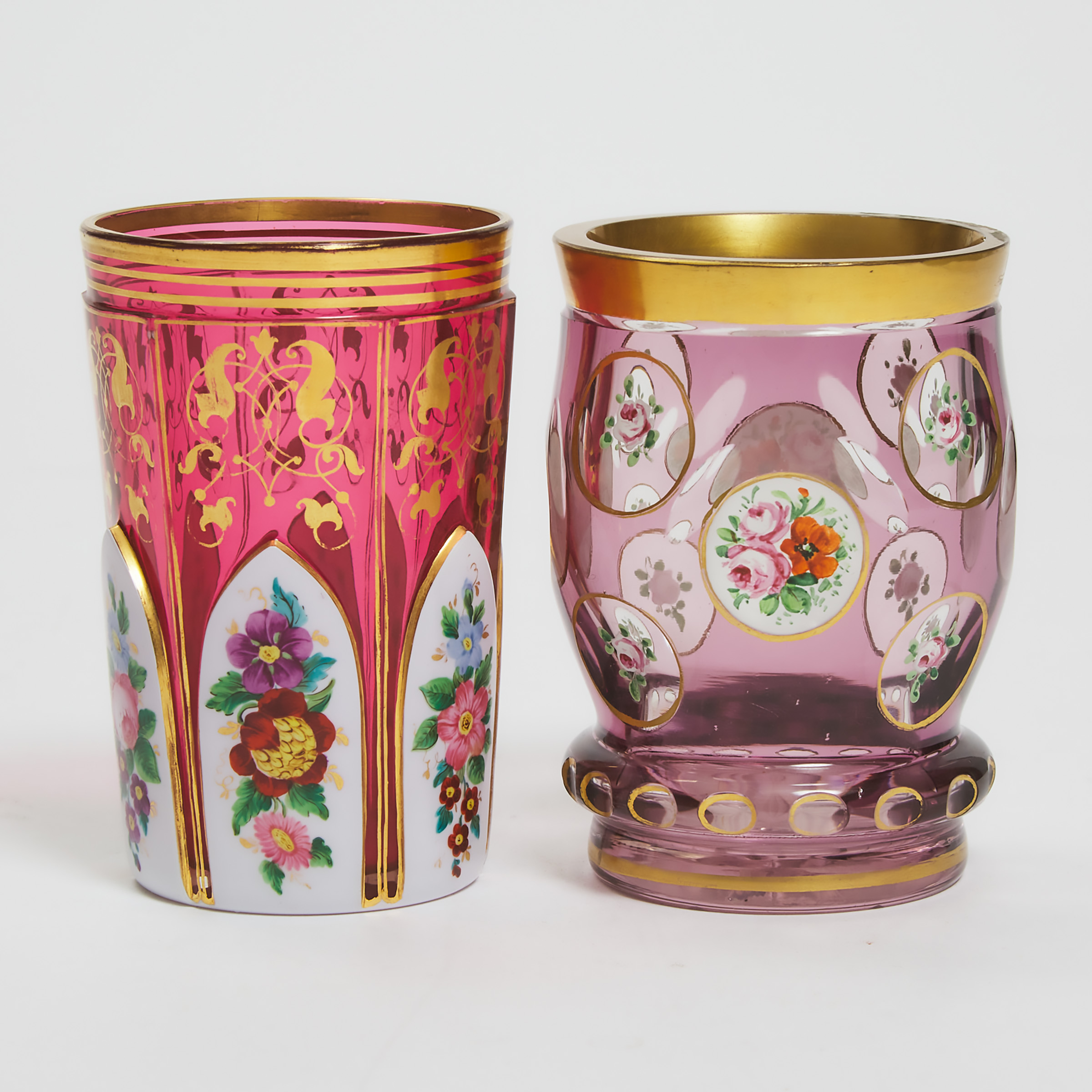 Two Bohemian Overlaid, Cut, Enameled, and Gilt Glass Beakers, second half of the 19th century