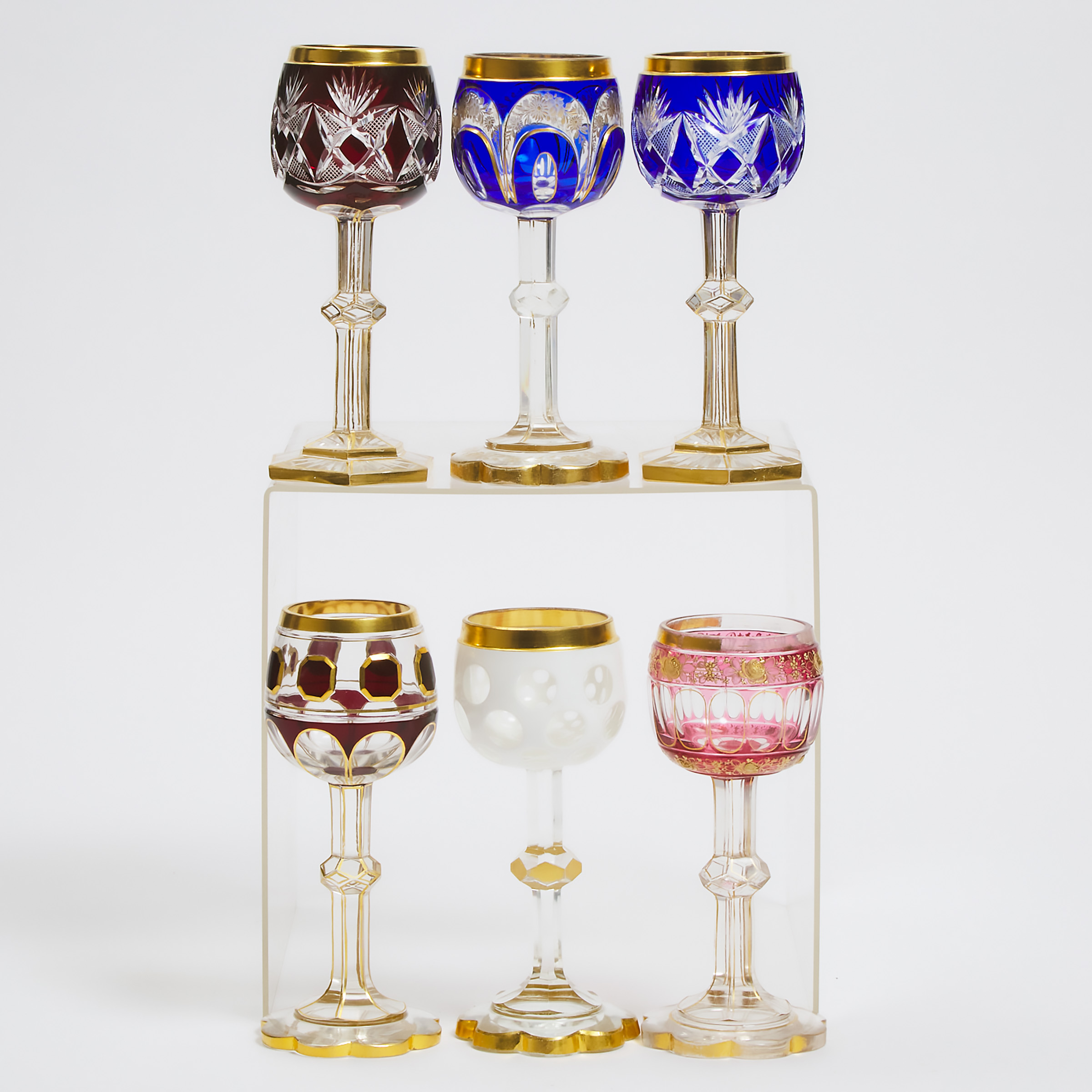 Six Bohemian Overlaid, Cut and Gilt Glass Wine Goblets, late 19th/early 20th century