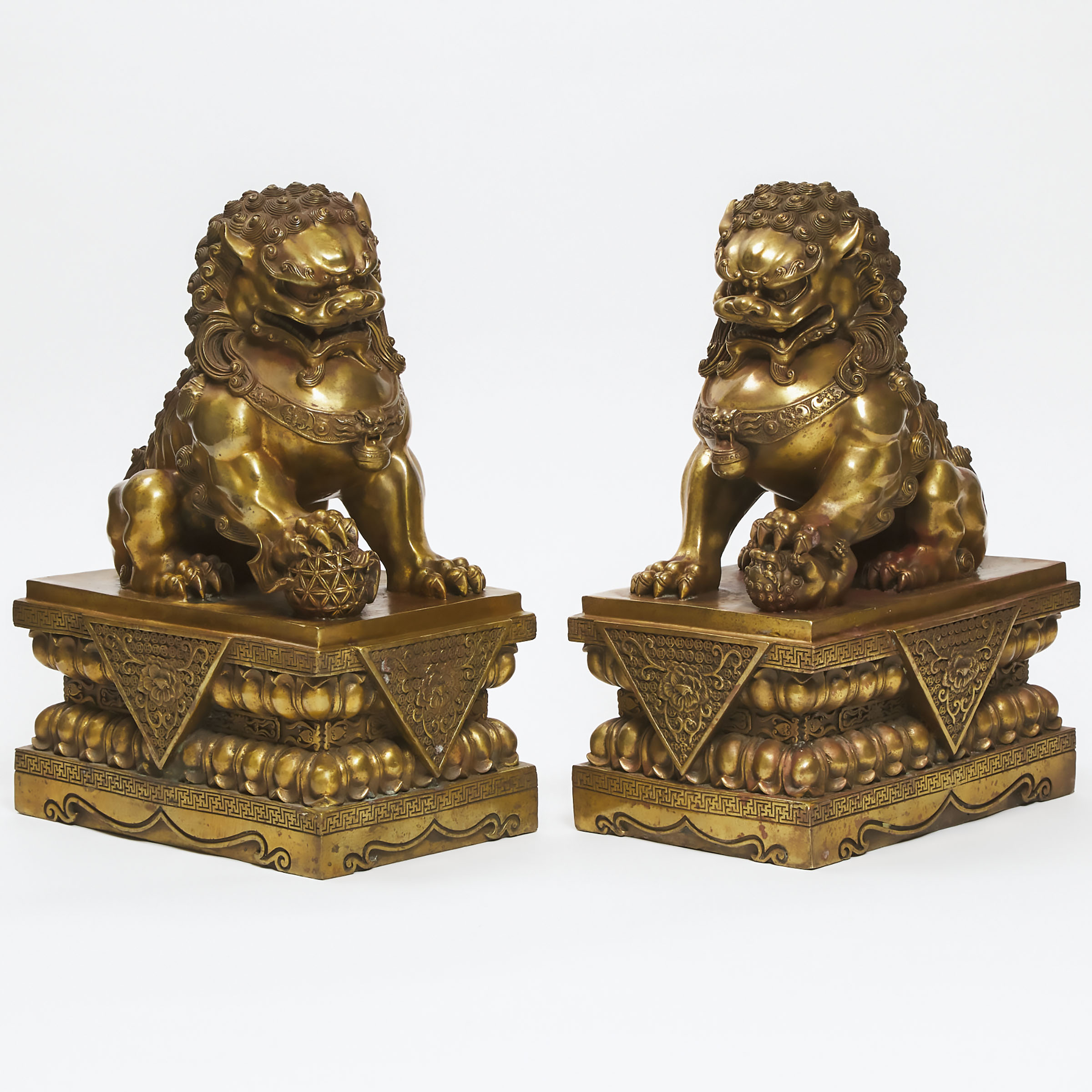 Large Pair of Buddhist Gilt Bronze Foo Dogs, early 20th century