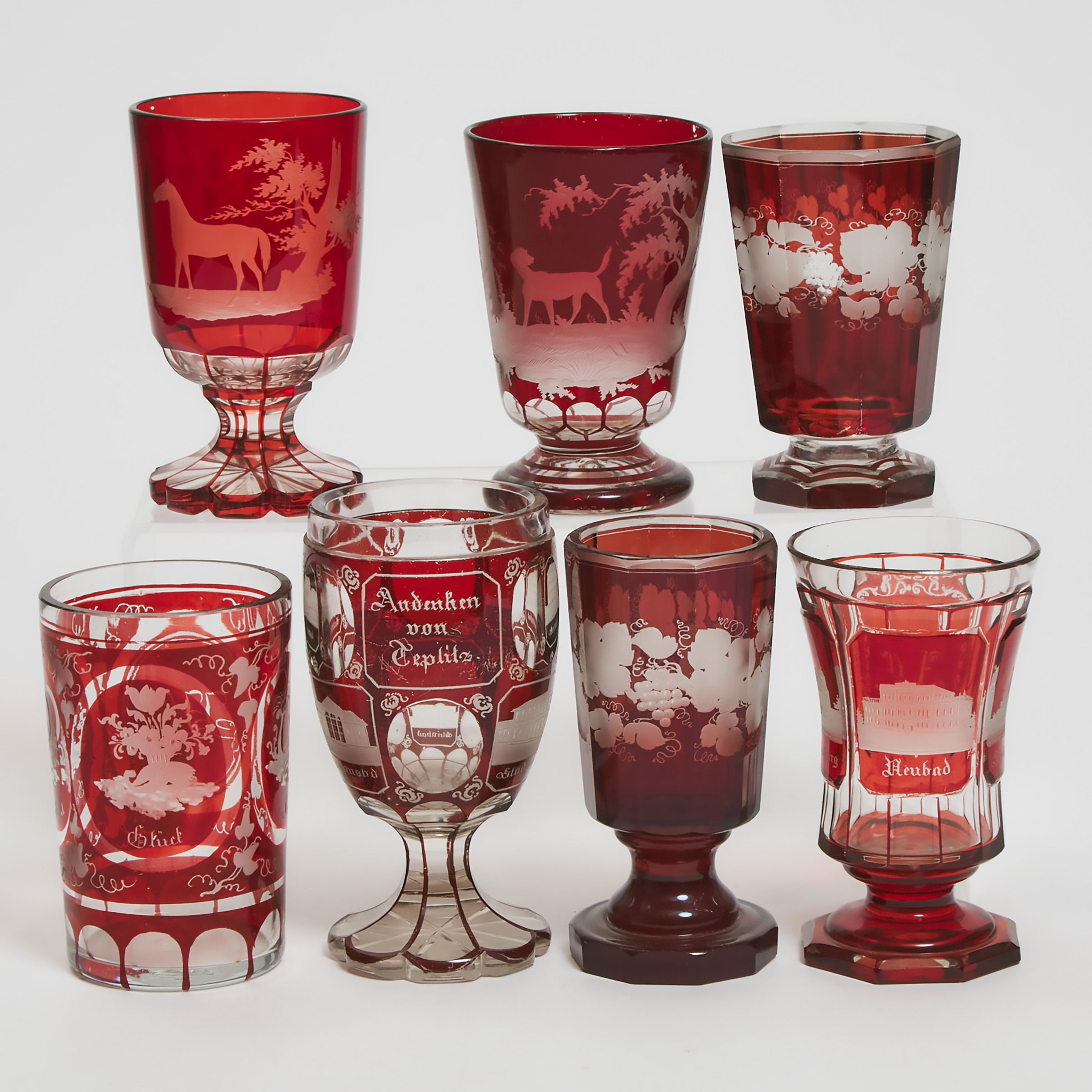 Seven Bohemian Red Overlay, Cut, and Etched Glass Goblets and Beakers, second half of the 19th century