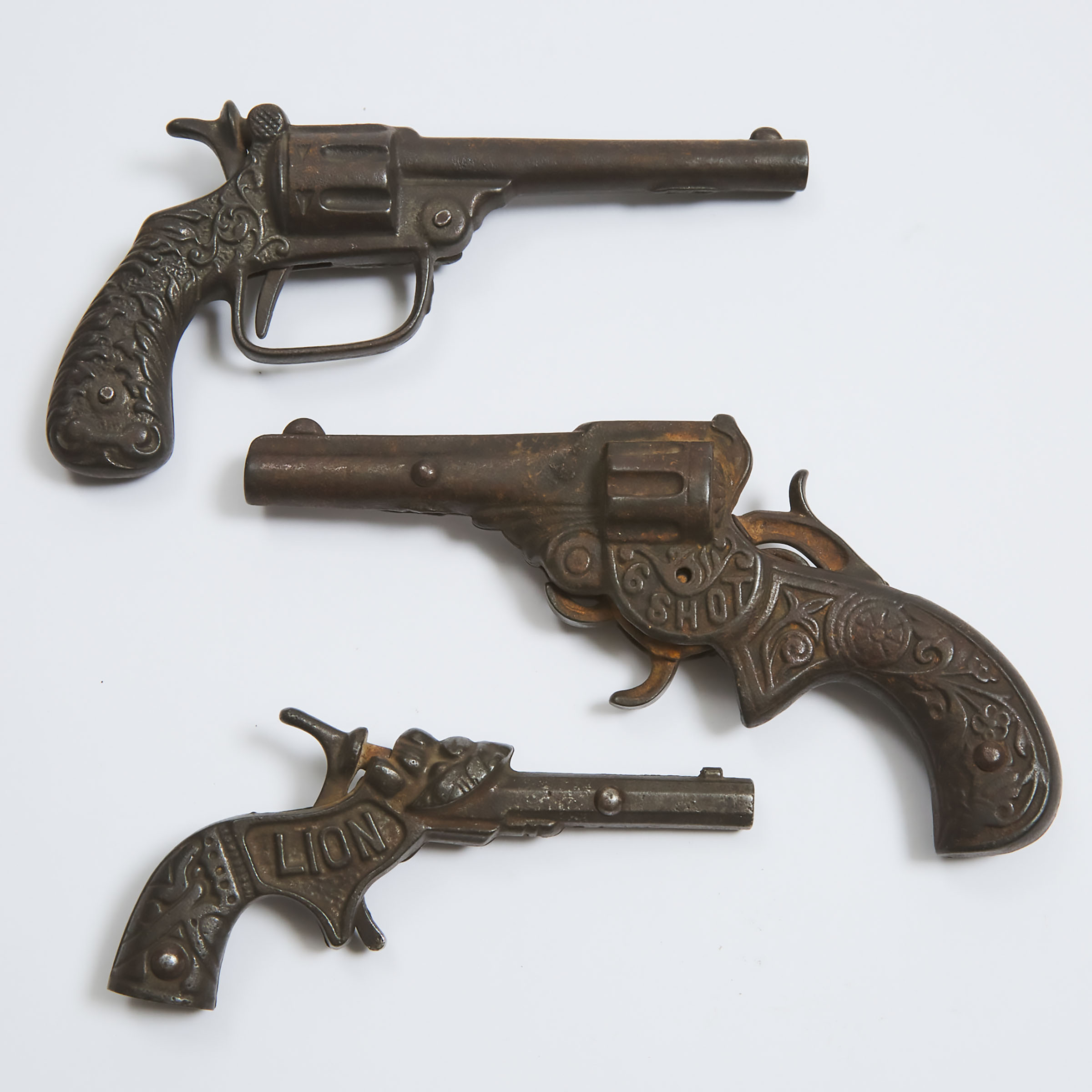 Three American Cast Iron Cap Guns, late 19th century