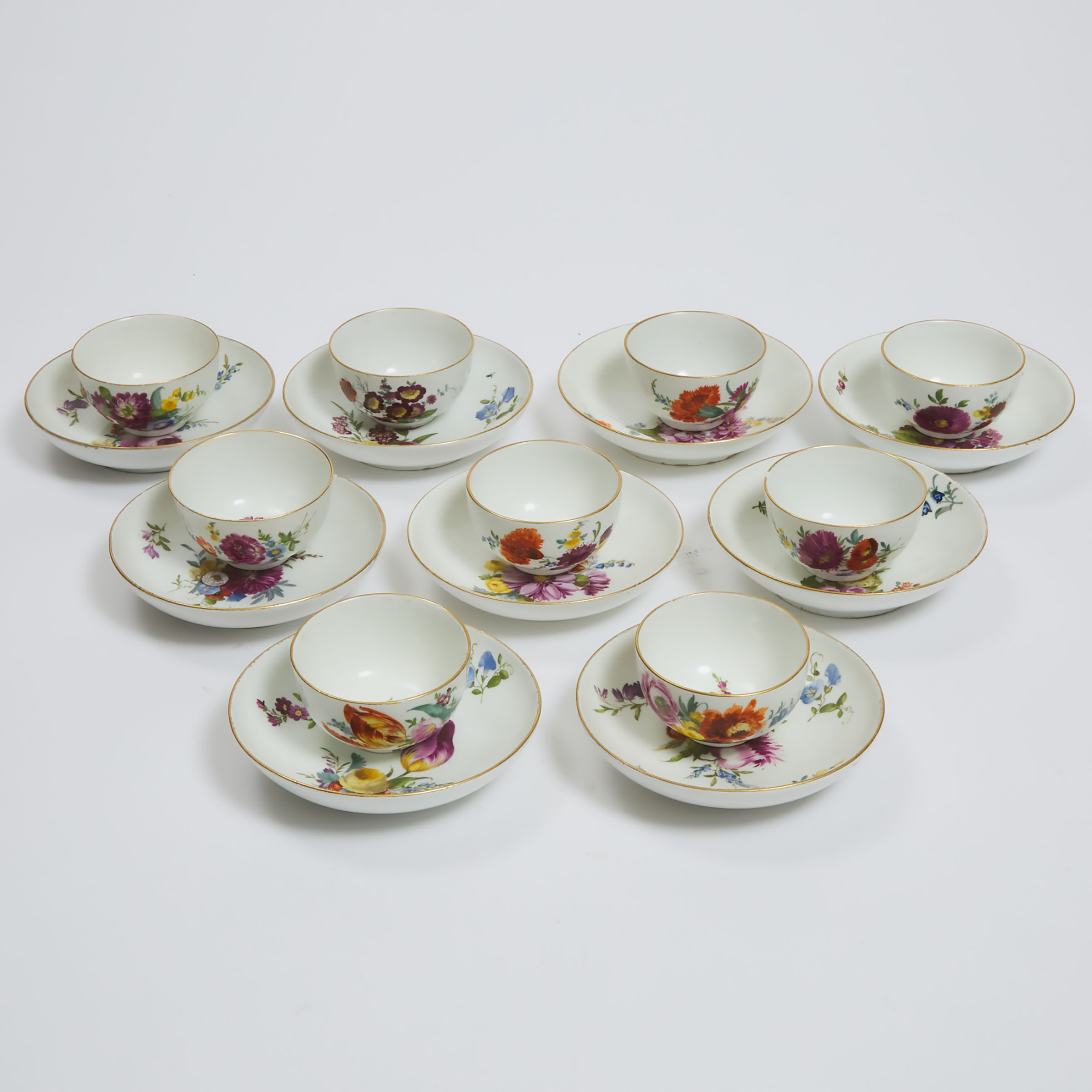 Nine Meissen Flower Painted Tea Bowls and Saucers, late 18th century