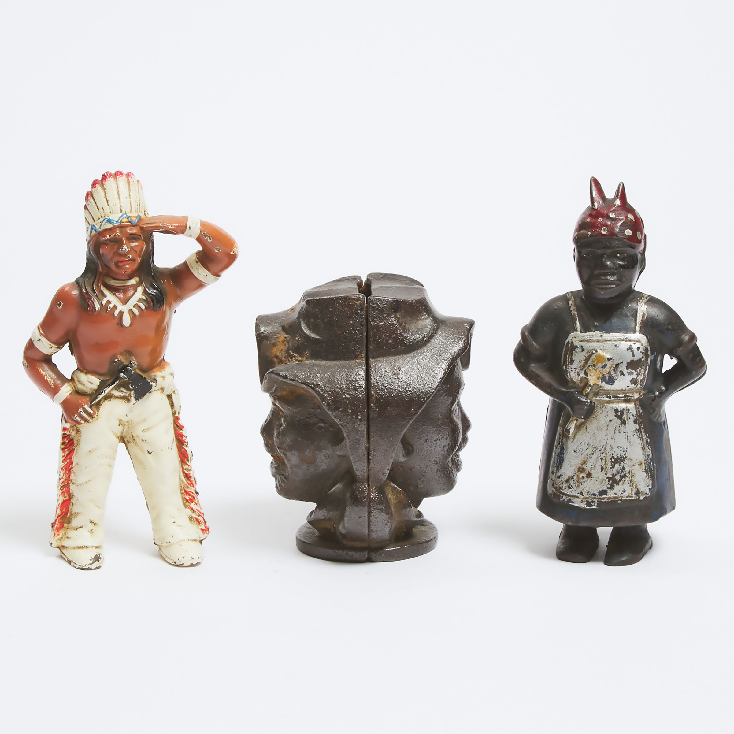 Two Painted Cast Iron Figural Still Banks and a Head Form Bank, 19th/early 20th centuries