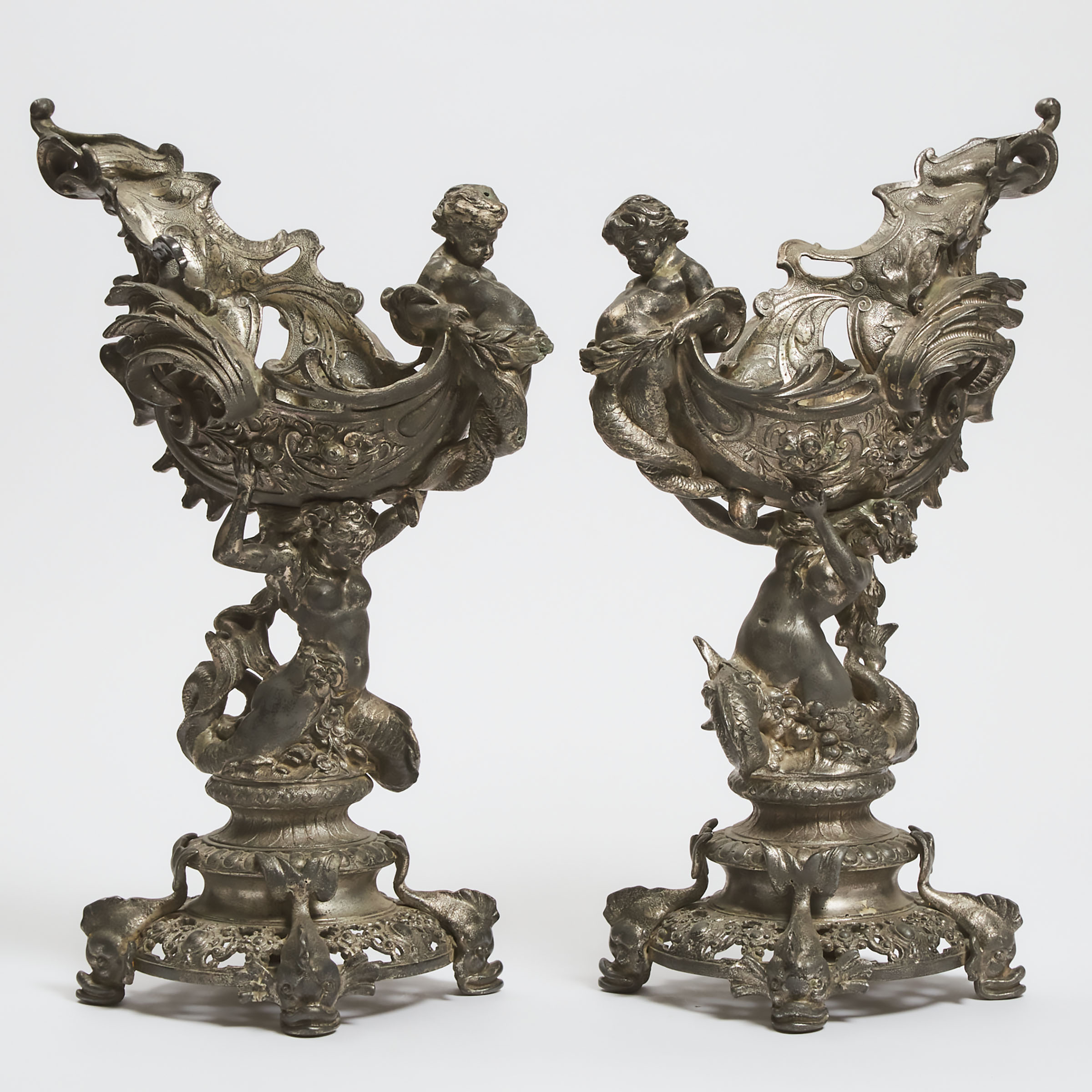 Large Pair of Continental Silvered Metal Figural 'Nautalus Cup' Form Tazzas, 19th/early 20th century