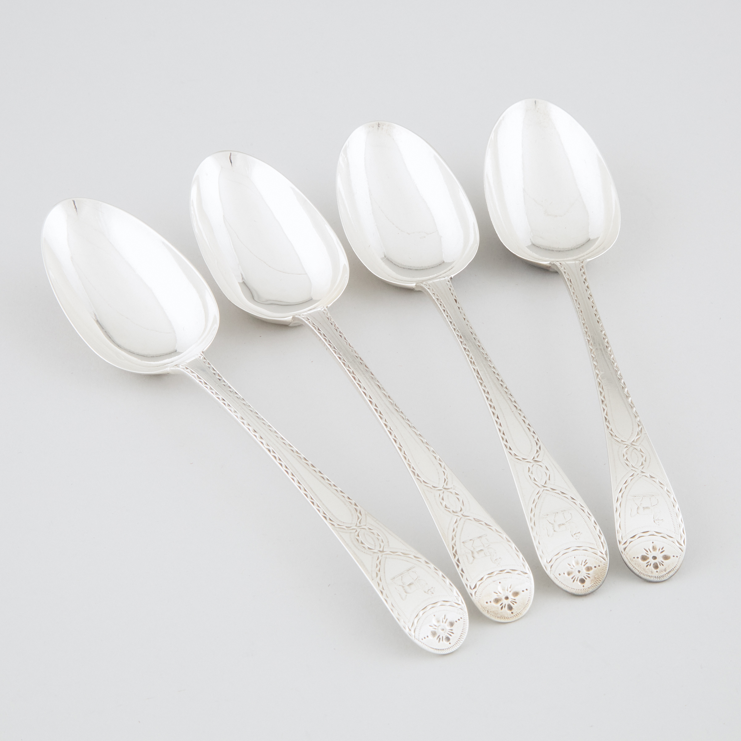Four George III Silver Bright-Cut Table Spoons, Hester Bateman, London, 1781