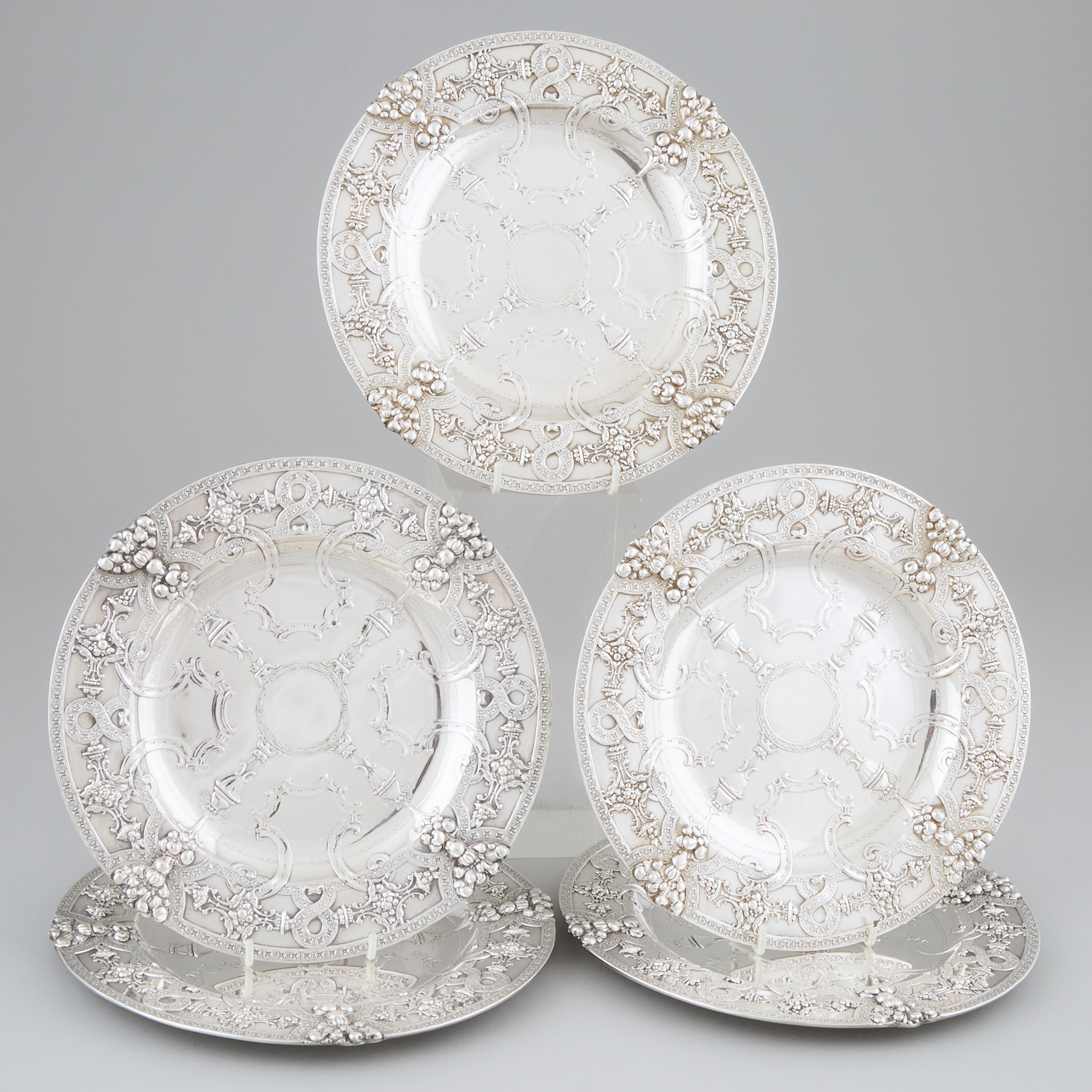 Five American Silver 'Renaissance' Service Plates, Tiffany & Co., New York, N.Y., c.1907-38