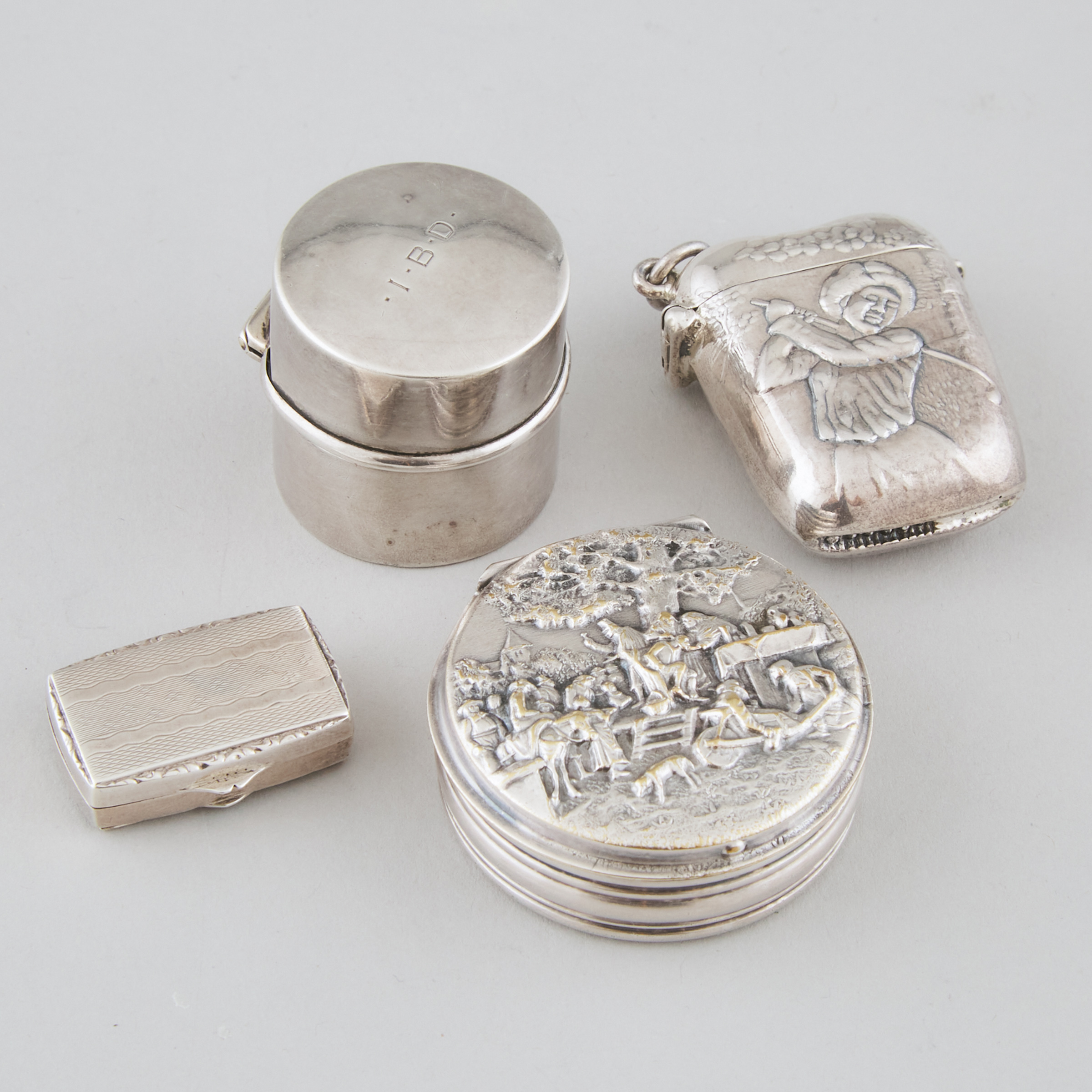 American Silver Lady Golfer Vesta Case, Edwardian Ring Box, Continental Pill Box, and a Danish Silver Plated Circular Box, late 19th/20th century