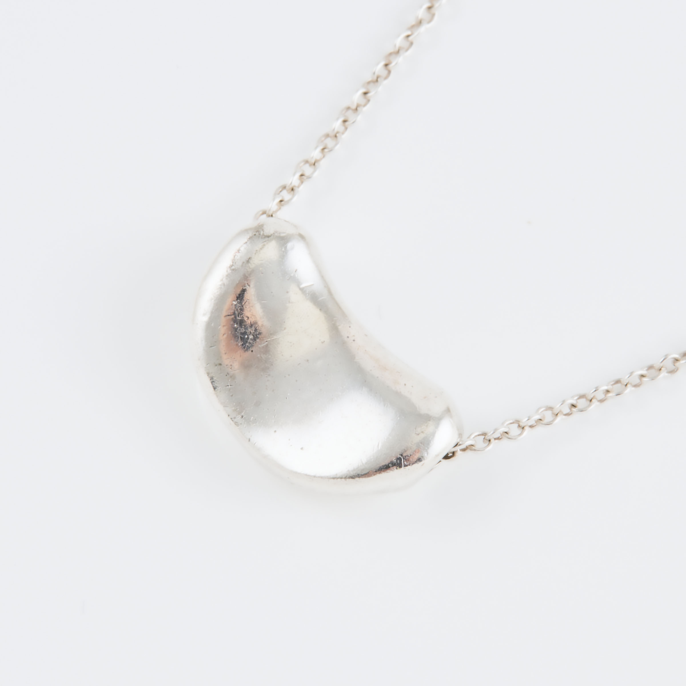 Tiffany & Co. Elsa Peretti Sterling Silver 'Bean' Pendant And Chain