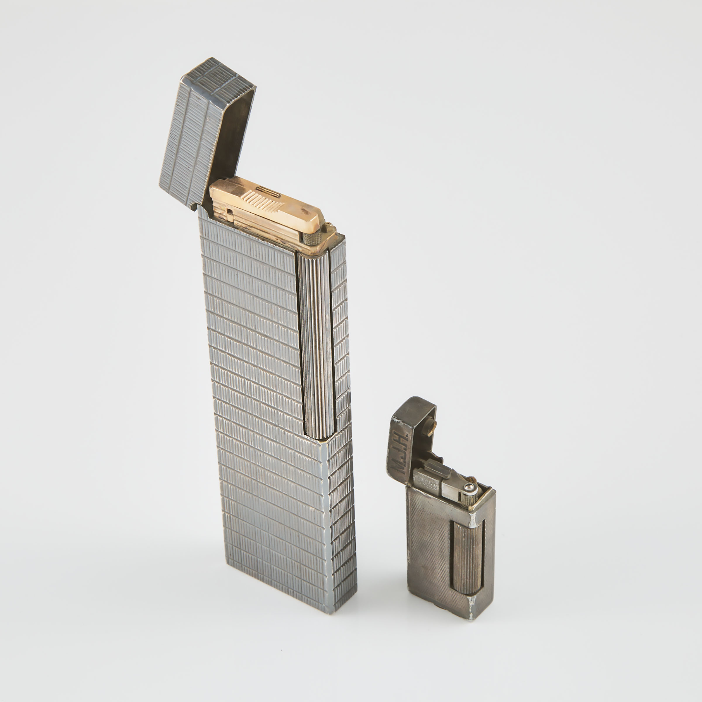 2 Silver-Plated Lighters