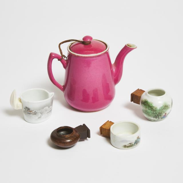 A Chinese Pink-Enameled Teapot, Together With Four Bird Feeders, 19th/20th Century