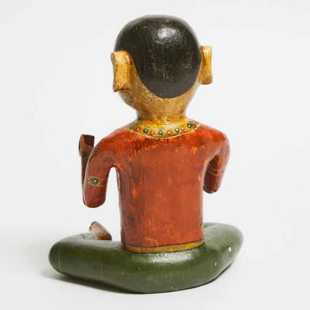 An Indian Polychrome Wood Figure of a Child, Gujarat, 19th Century