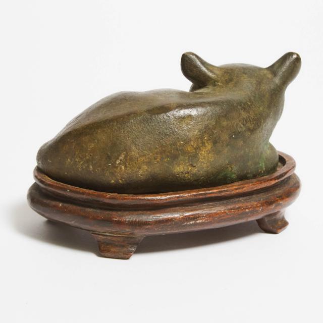 A Japanese Bronze Model of a Recumbent Cat, 19th Century