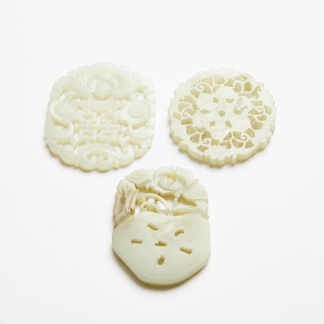 A Group of Three White Jade Reticulated Plaques, Ming/Qing Dynasty