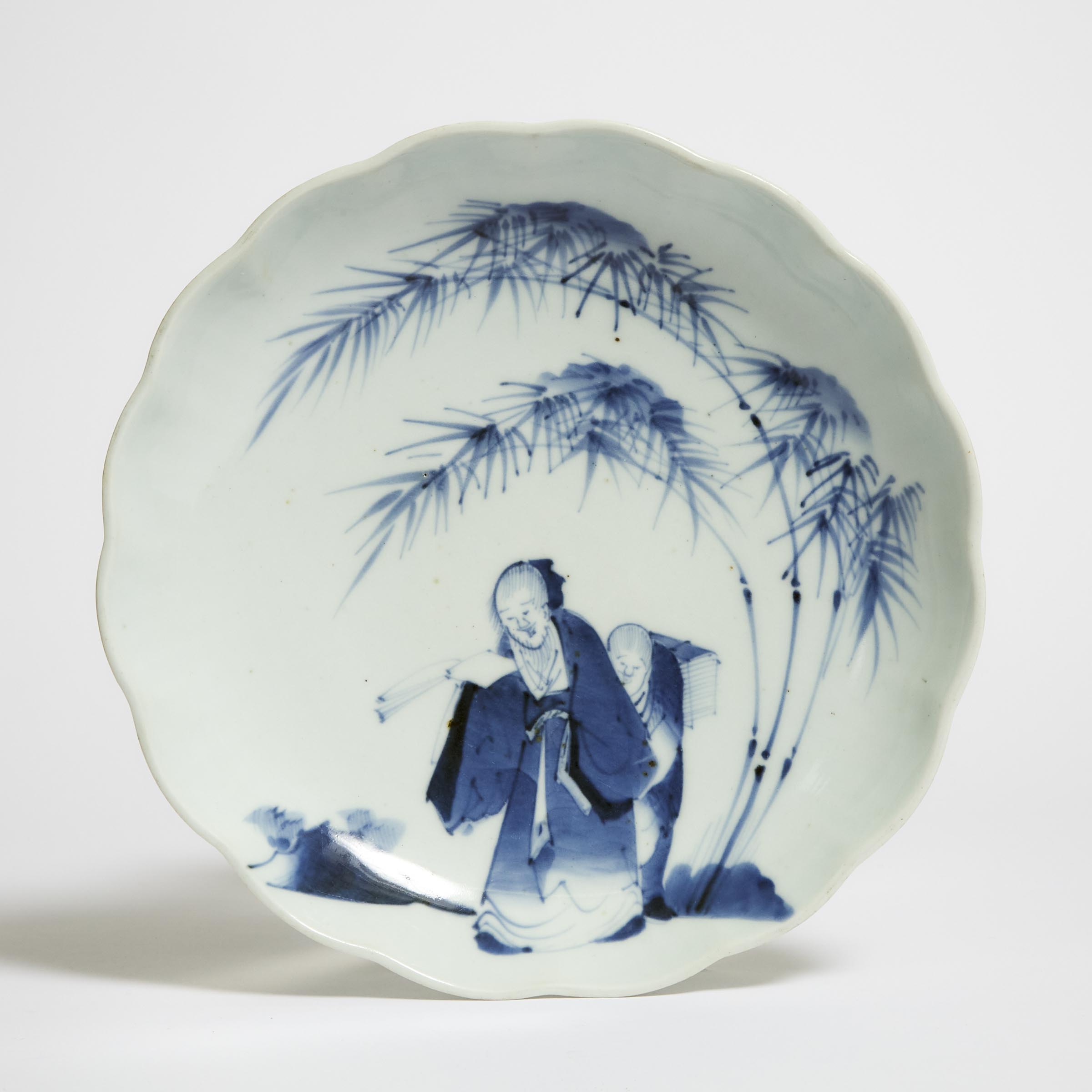 A Japanese Arita Blue and White 'Scholar' Charger, Edo Period, Early 19th Century