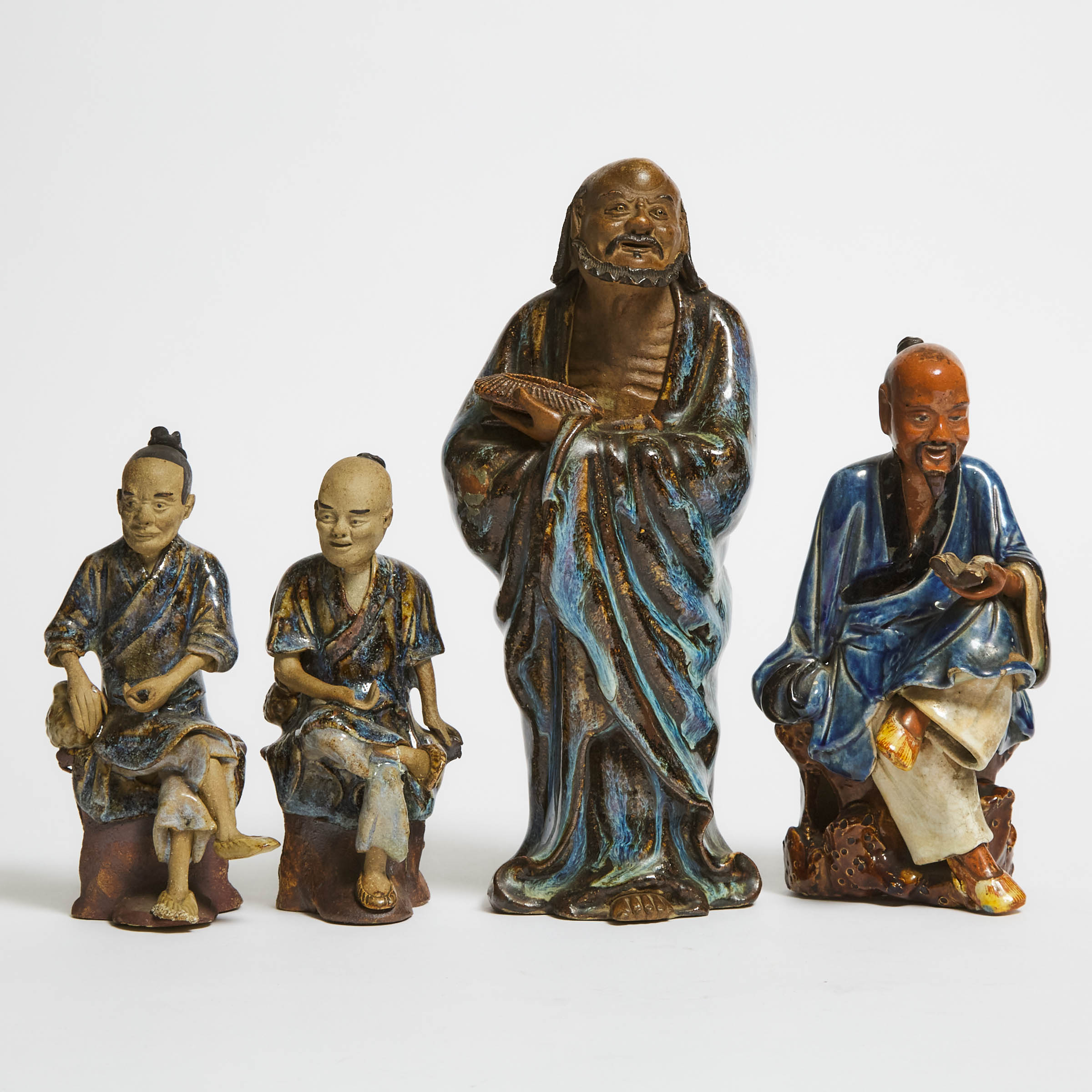 A Group of Four Shiwan Figures, 19th/20th Century