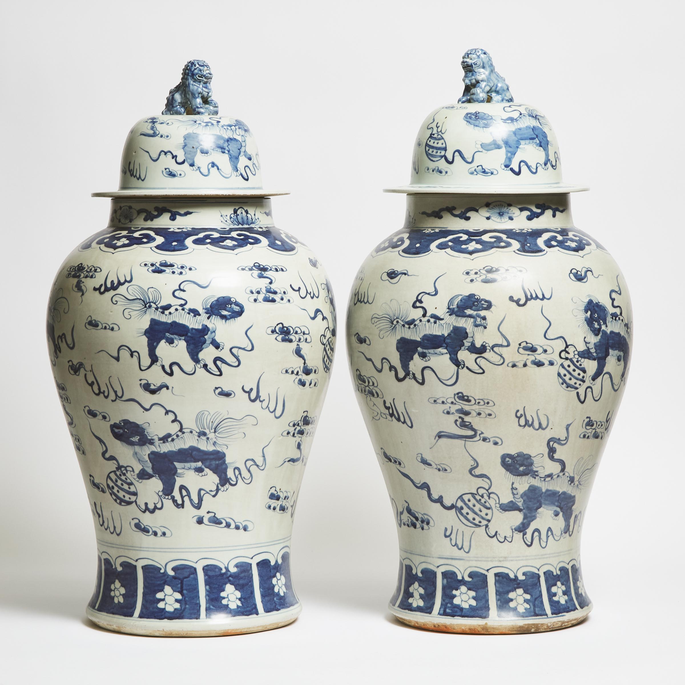 A Pair of Large Ming-Style Blue and White 'Buddhist Lion' Vases and Covers, First Half of 20th Century
