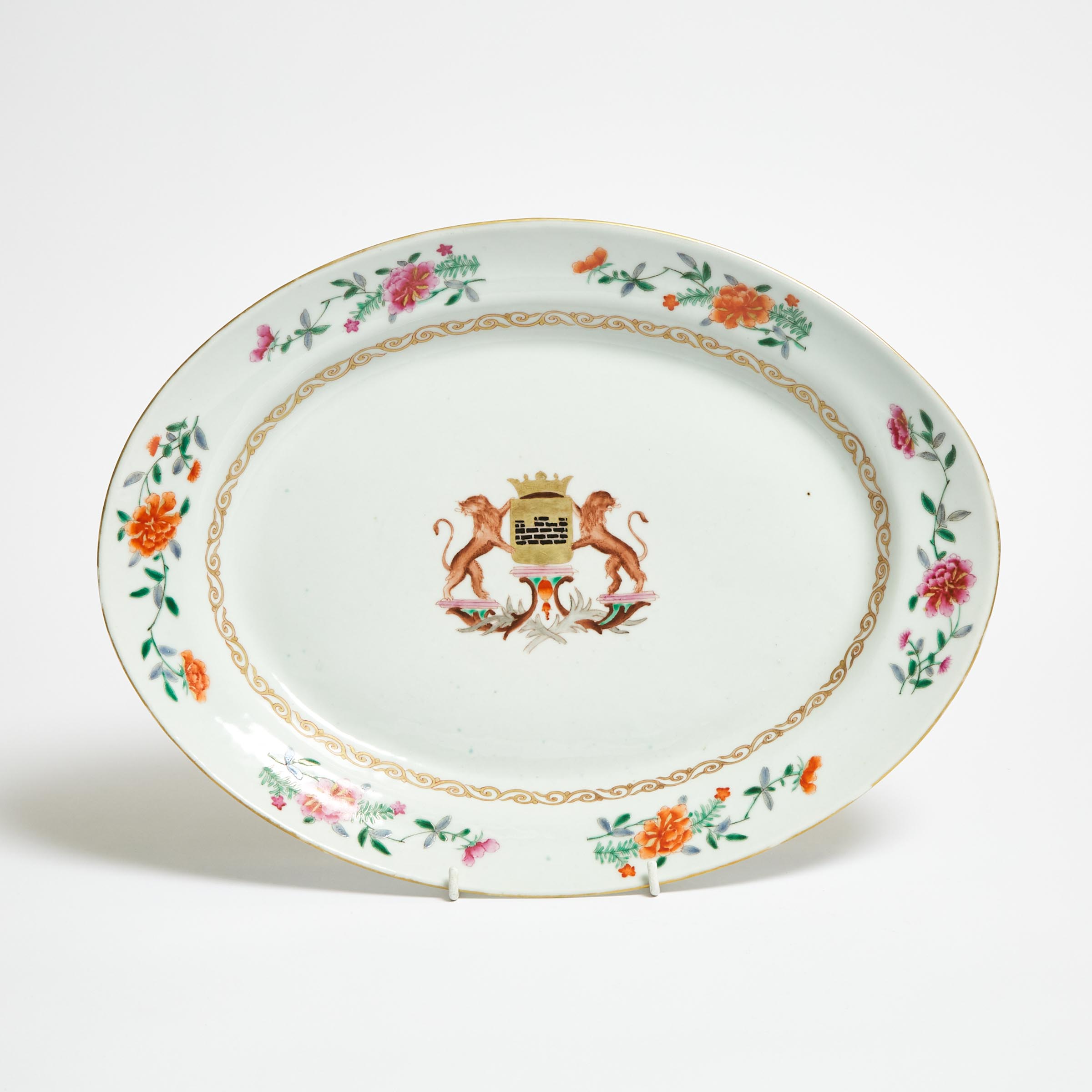 A Large Famille Rose Armorial Oval Platter, 18th Century