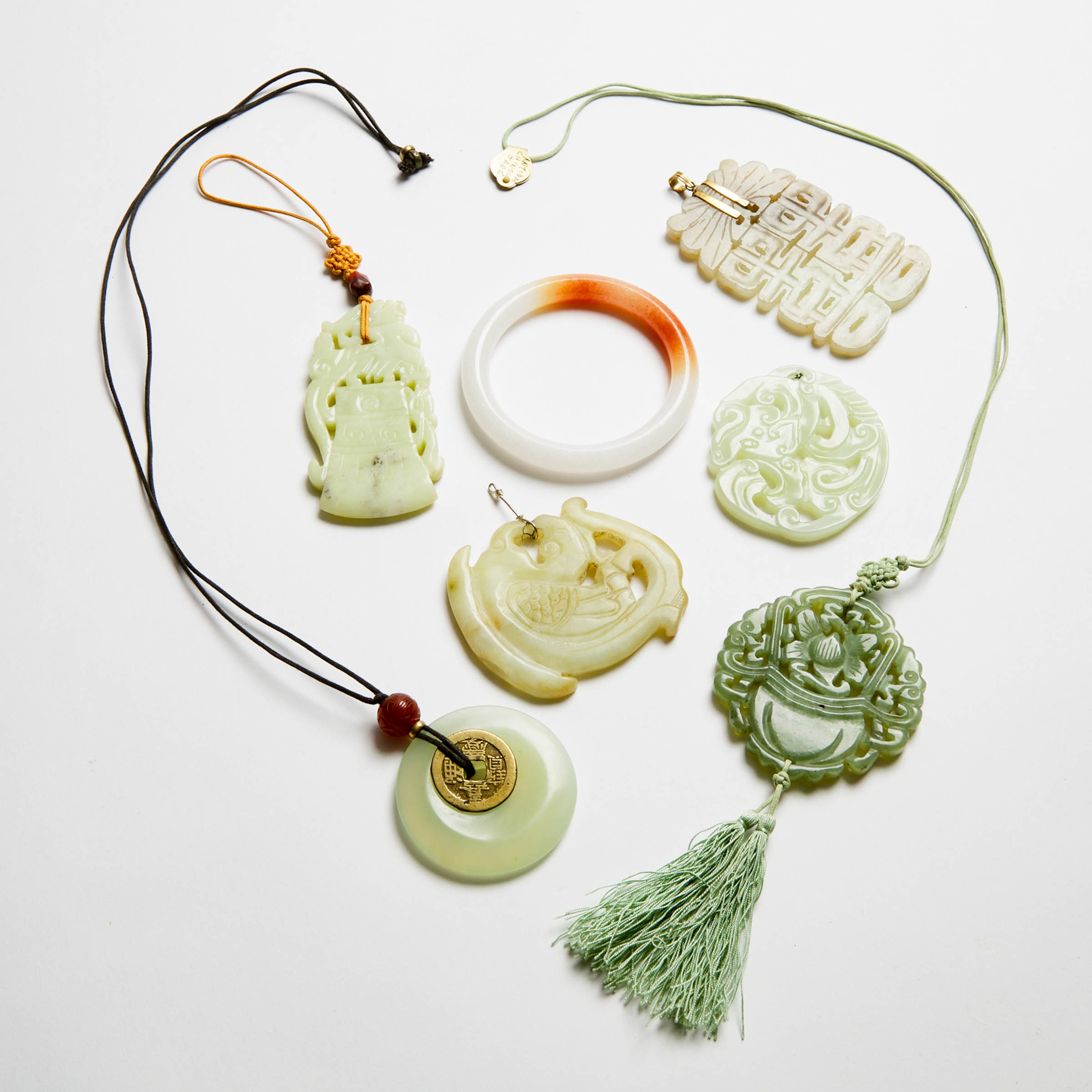 A Greyish Russet Jade 'Double Happiness' Pendant, Together With Six Hardstone Pendants and Bangle, 19th/20th Century