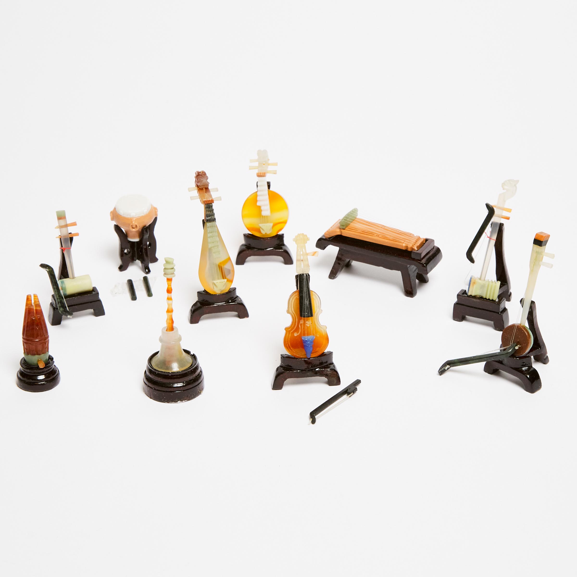 A Set of Ten Miniature Hardstone Musical Instruments, 20th Century