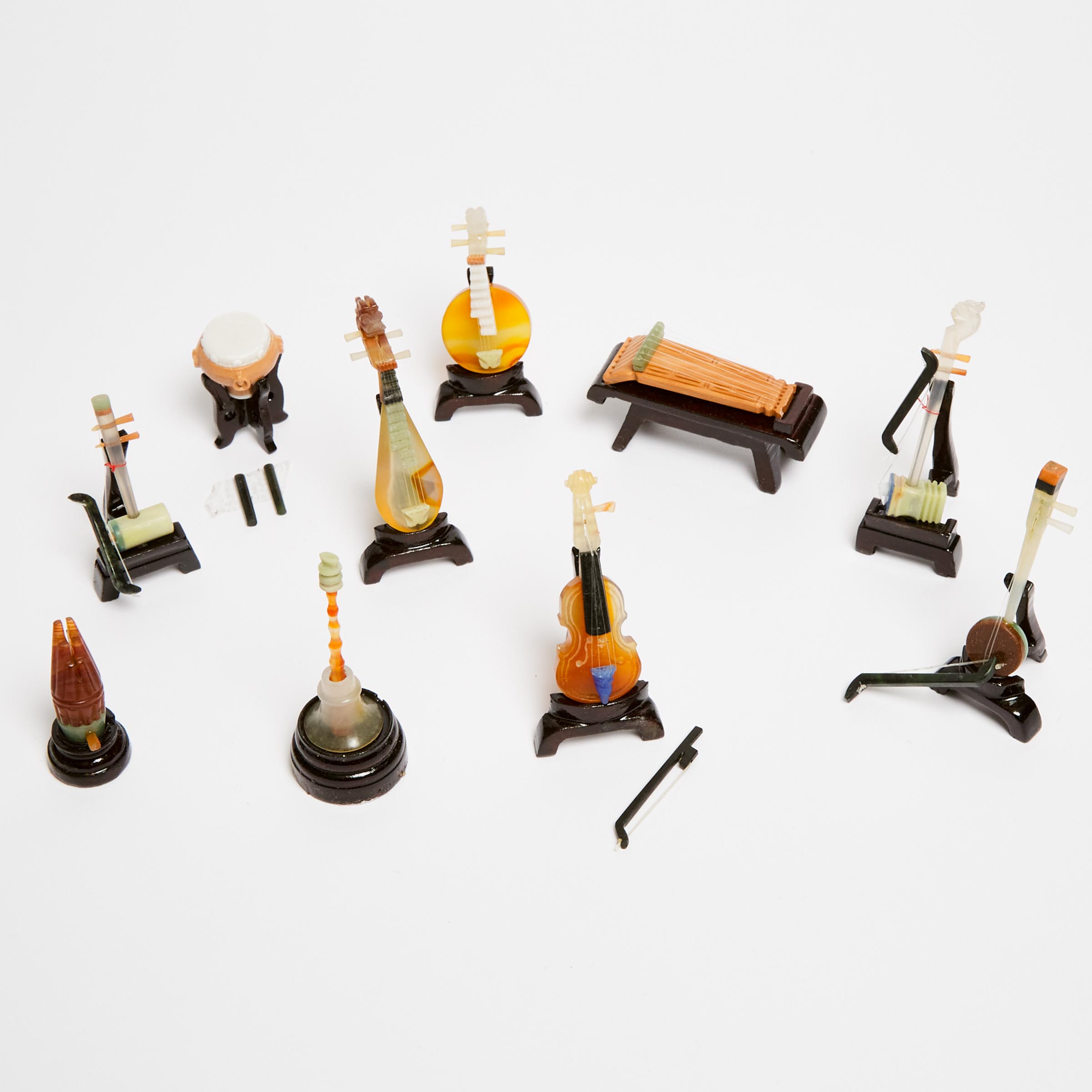A Set of Ten Miniature Hardstone Musical Instruments, 20th Century