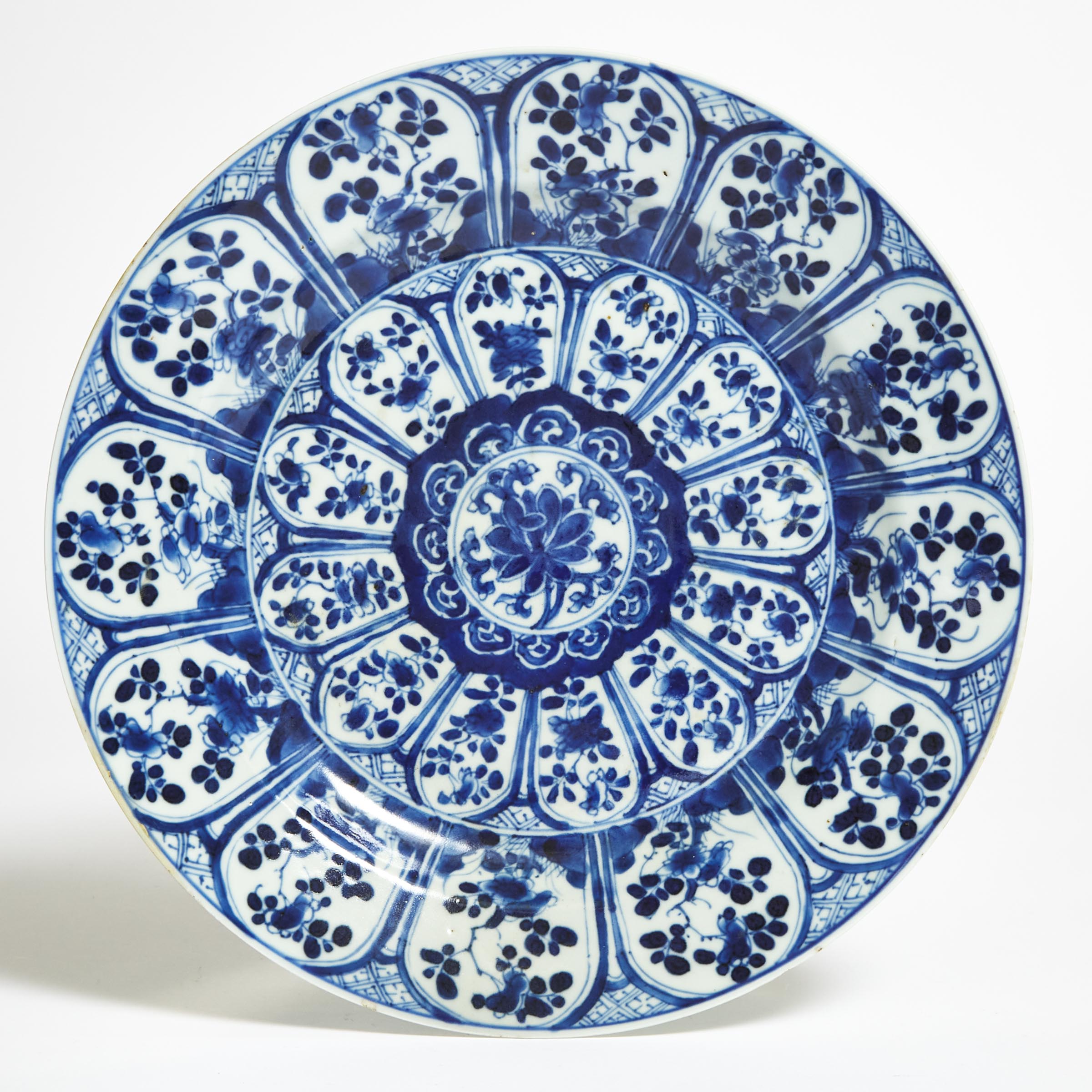 A Blue and White 'Floral' Dish, Kangxi Period (1662-1722)