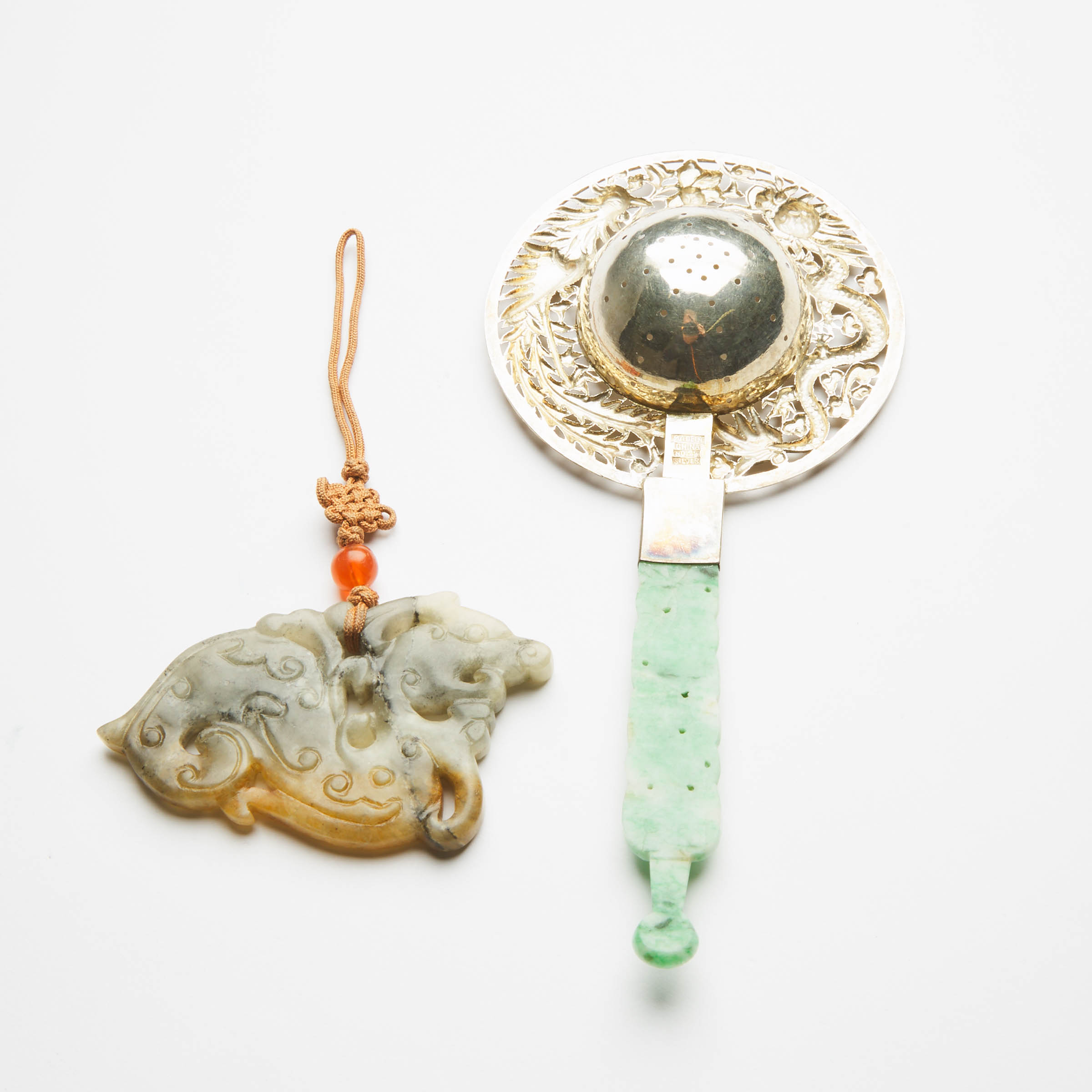 A Jadeite-Mounted Silver Tea Strainer, Together With a Greyish-White and Russet Jade 'Dragon' Pendant, 19th/20th Century