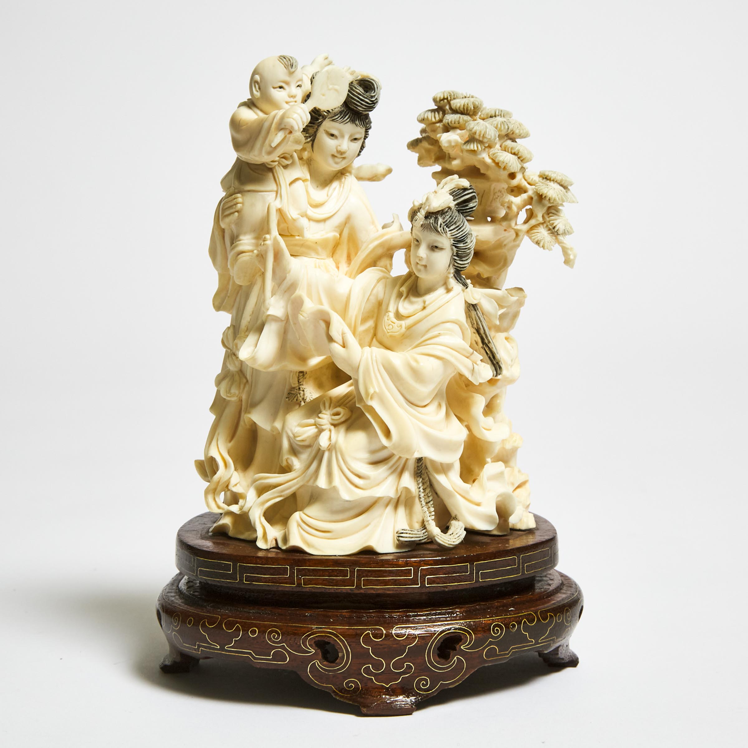 An Ivory Carving of Two Ladies and a Boy, Mid 20th Century