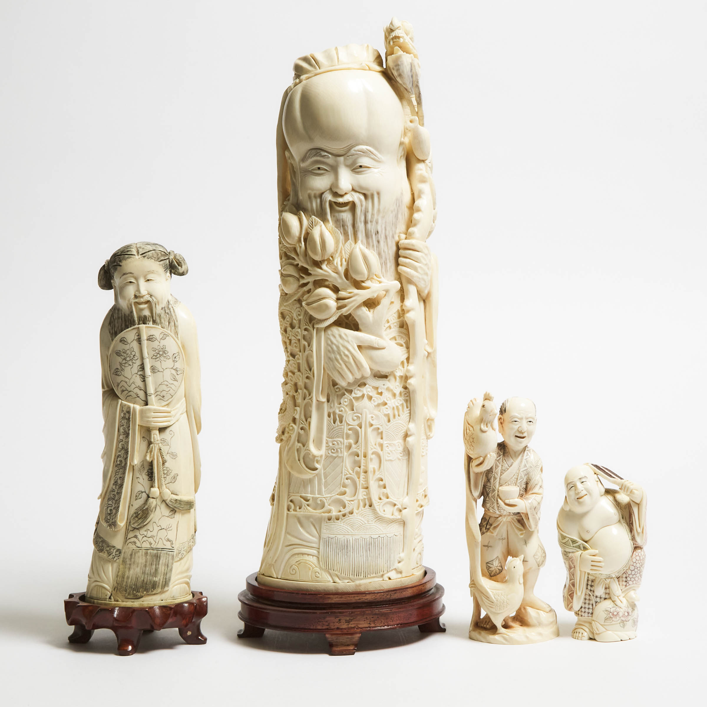 A Group of Four Ivory Figures, Early to Mid 20th Century
