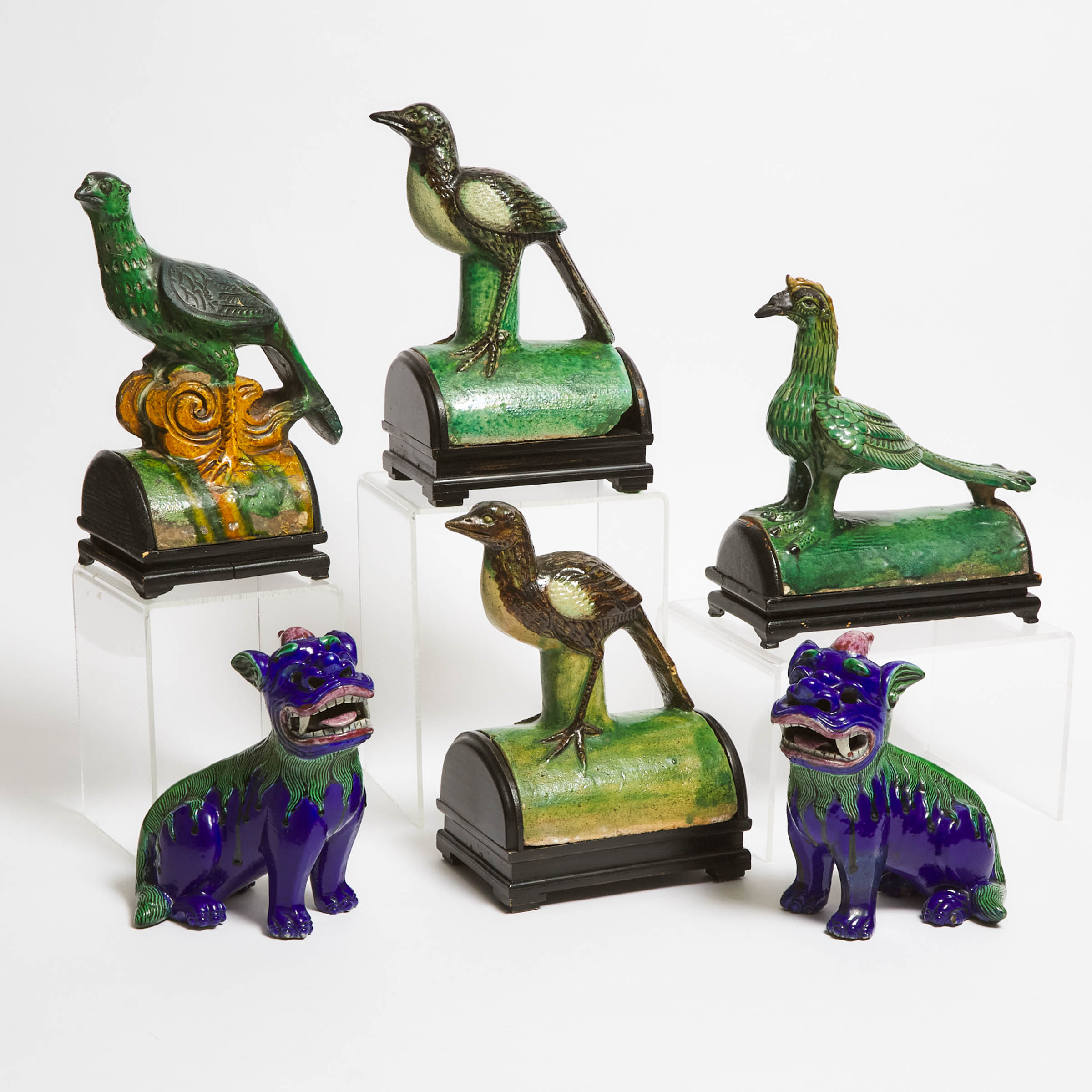 Four Green-Glazed Bird-Form Pottery Tiles, Together With a Pair of Blue-Glazed Lions, Ming/Qing Dynasty